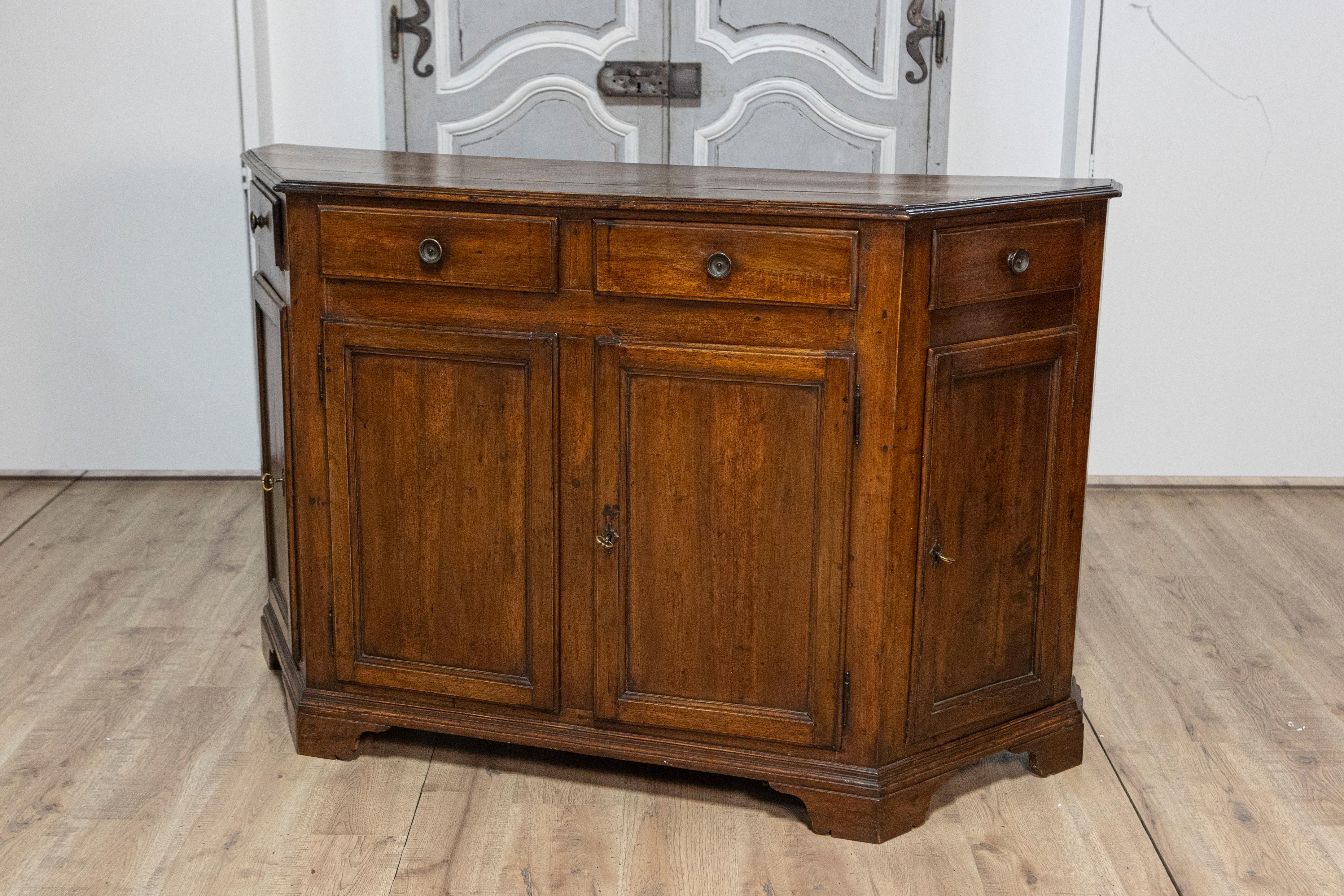 Carved  Venetian 19th Century Walnut Credenza with Canted Sides, Drawers and Doors For Sale