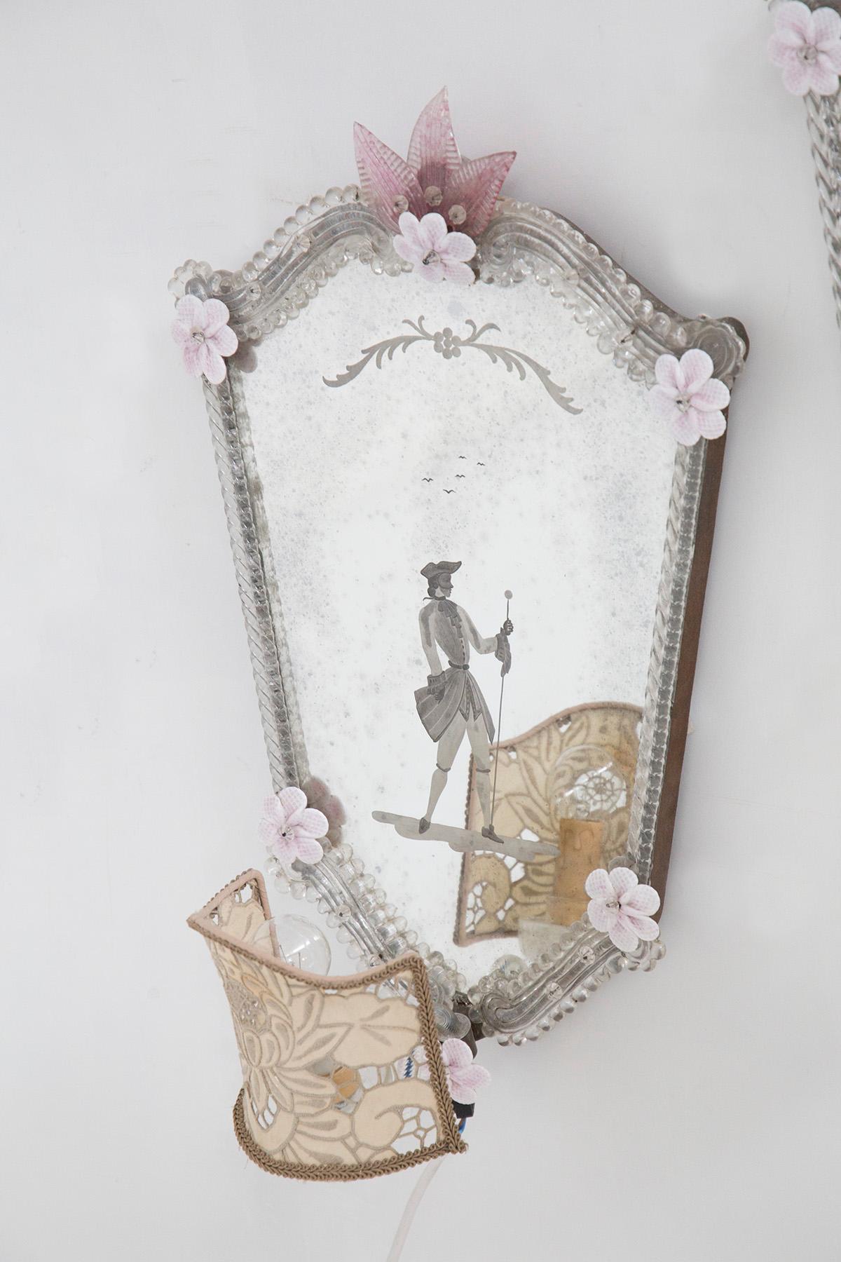 Gorgeous pair of antique Venetian mirrors dating back to the 1800s, they are from a Venetian noble family. 
The mirrors have the special feature of being illuminated, giving a gentle effect in contrast to the mirror.
The mirrors have a very softened