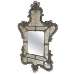 Specchio decorativo veneziano antico ornato e inciso