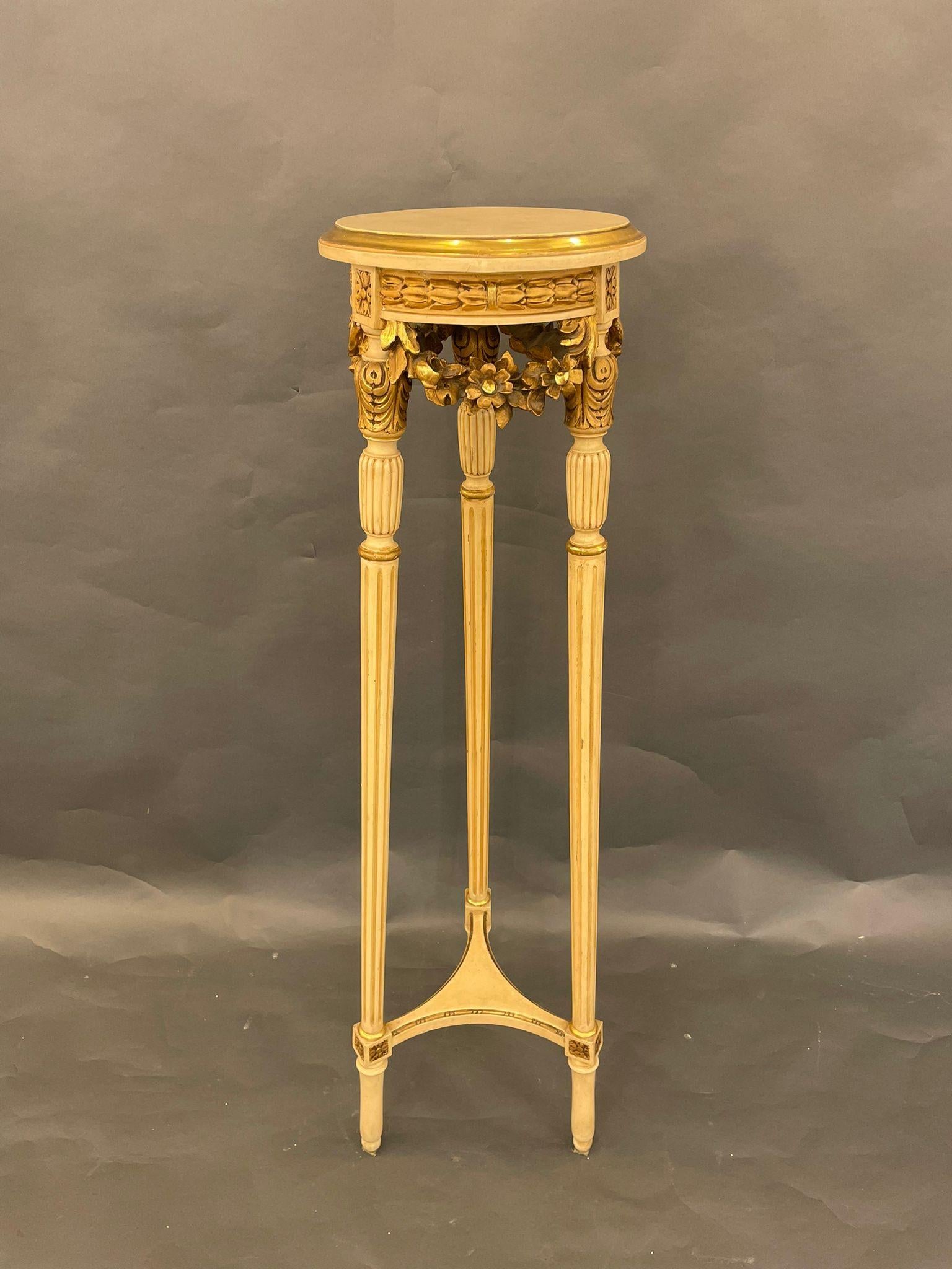 An elegant Jansens French Louis XVI style with a gilt-wood pedestal, late 19 century. The pedestal fixture is hand-carved with intricate floral motifs, overlays and gilding. You can see the age of the piece in its characteristic patina. This