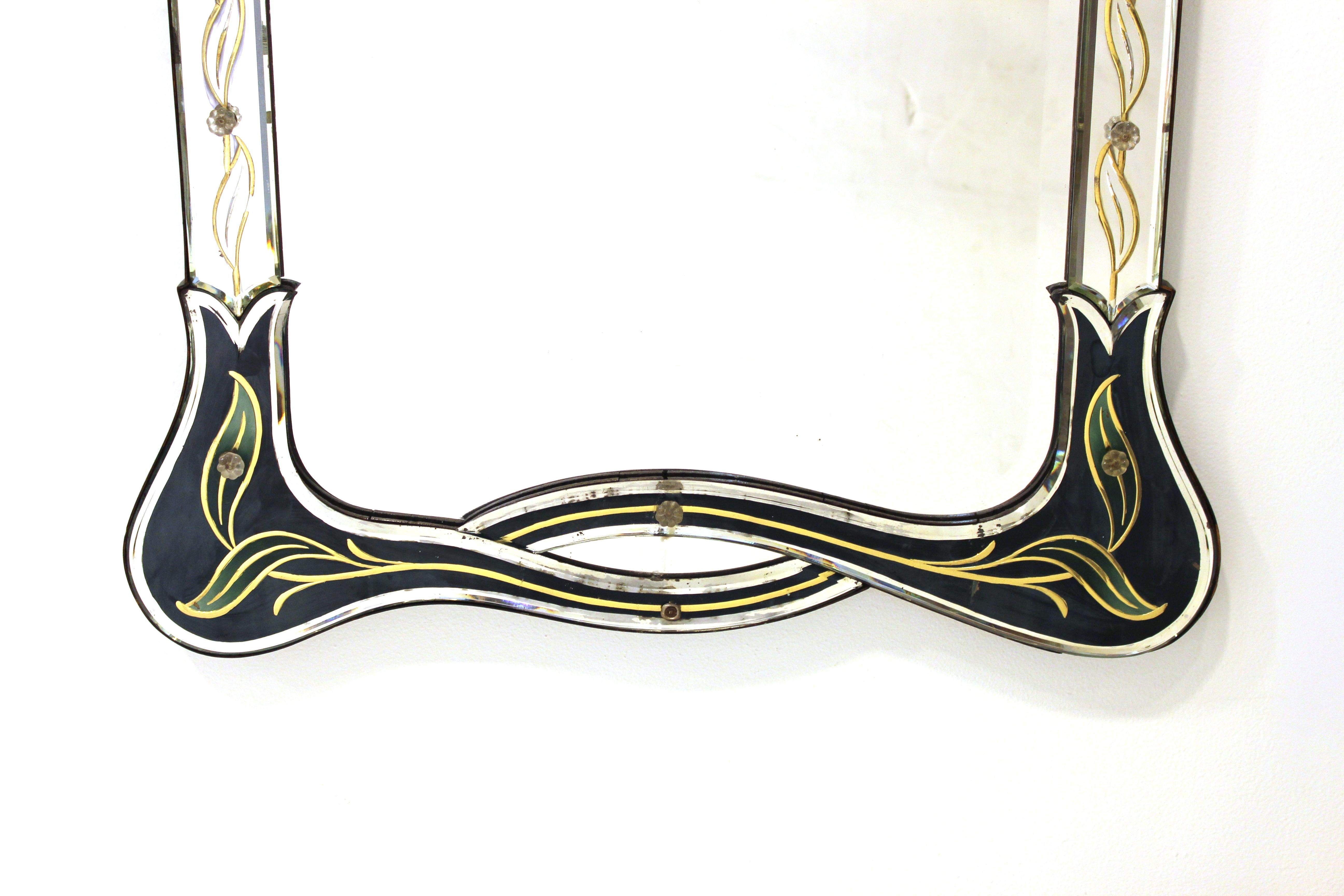 Venetian Art Nouveau style midcentury wall mirror with decorative organic lines and colored glass mirror parts. The mirror has some age-appropriate wear and age to its mirrored surfaces, but is in overall great vintage condition.