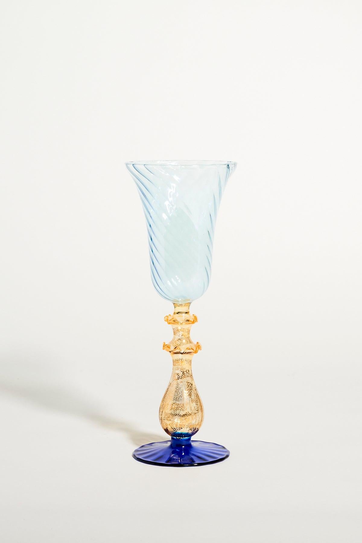 Venetian blown glass goblet with metallic amber gold stem.