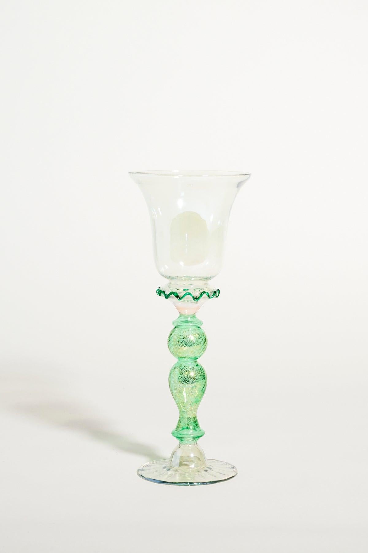 Venetian blown glass goblet with metallic green and gold stem.
