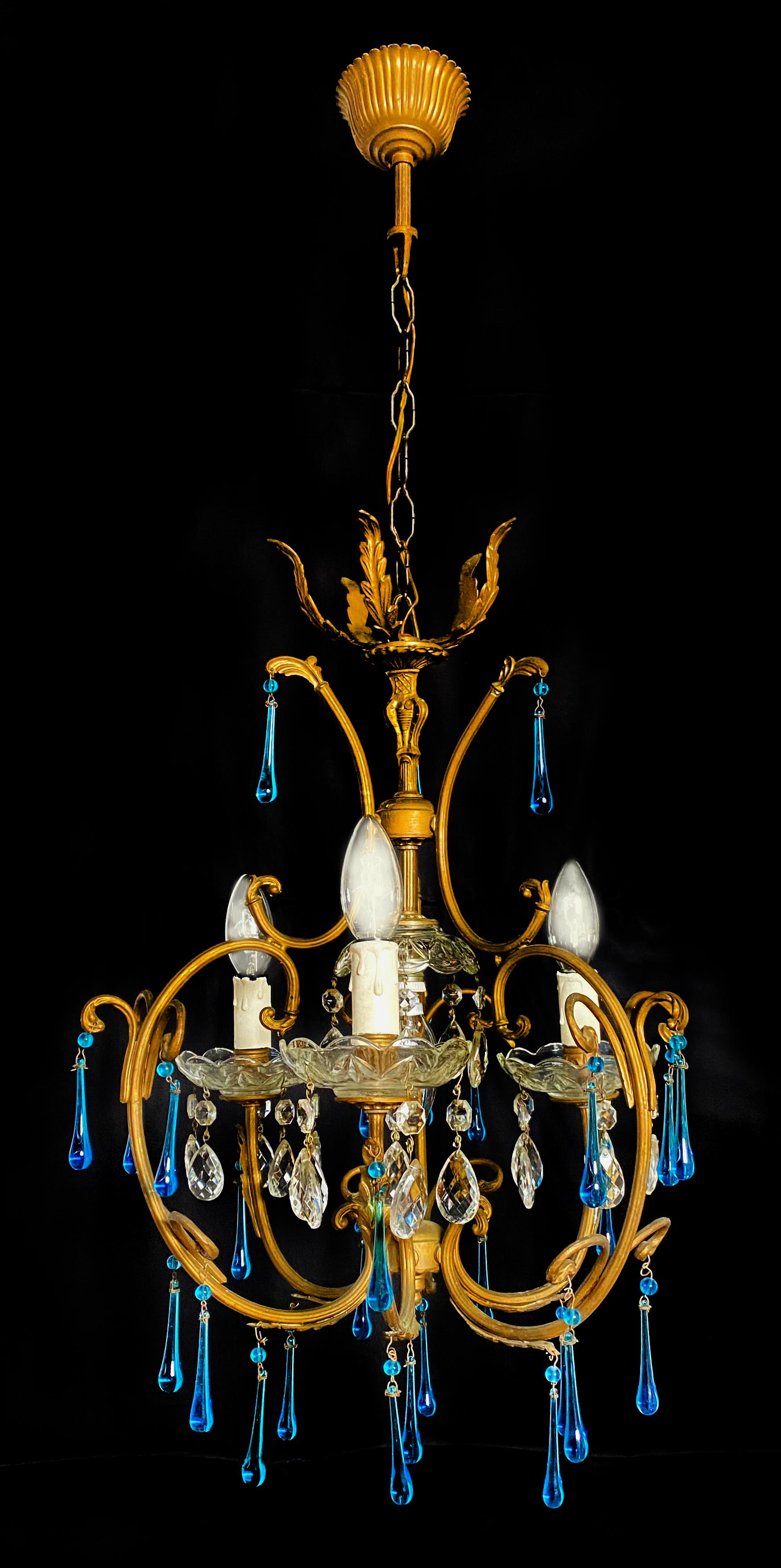 Elegant Venetian chandelier. Bronze canopys. 3 small lights. 
 