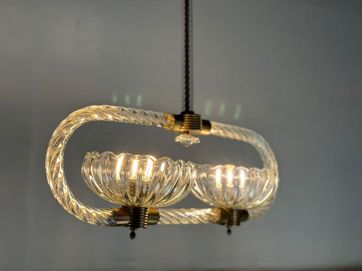 Venetian chandelier in colorless Murano glass and brass 

Circa 1950 

New electrification