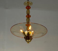 Venetian chandelier in gilded and orange Murano glass, around 1920