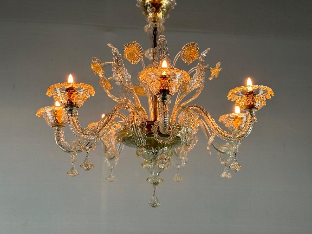 Lustre vénitien en verre de Murano doré, 7 bras de lumière 

Vers 1930
