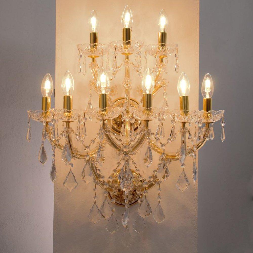 Elegant handcrafted wall light in Murano Glass with hanging crystal pendants and octagon garlands, Made in Italy Venetian sconce
This stunning Venetian style lamp is a great design piece that will surely add luxury and class to your