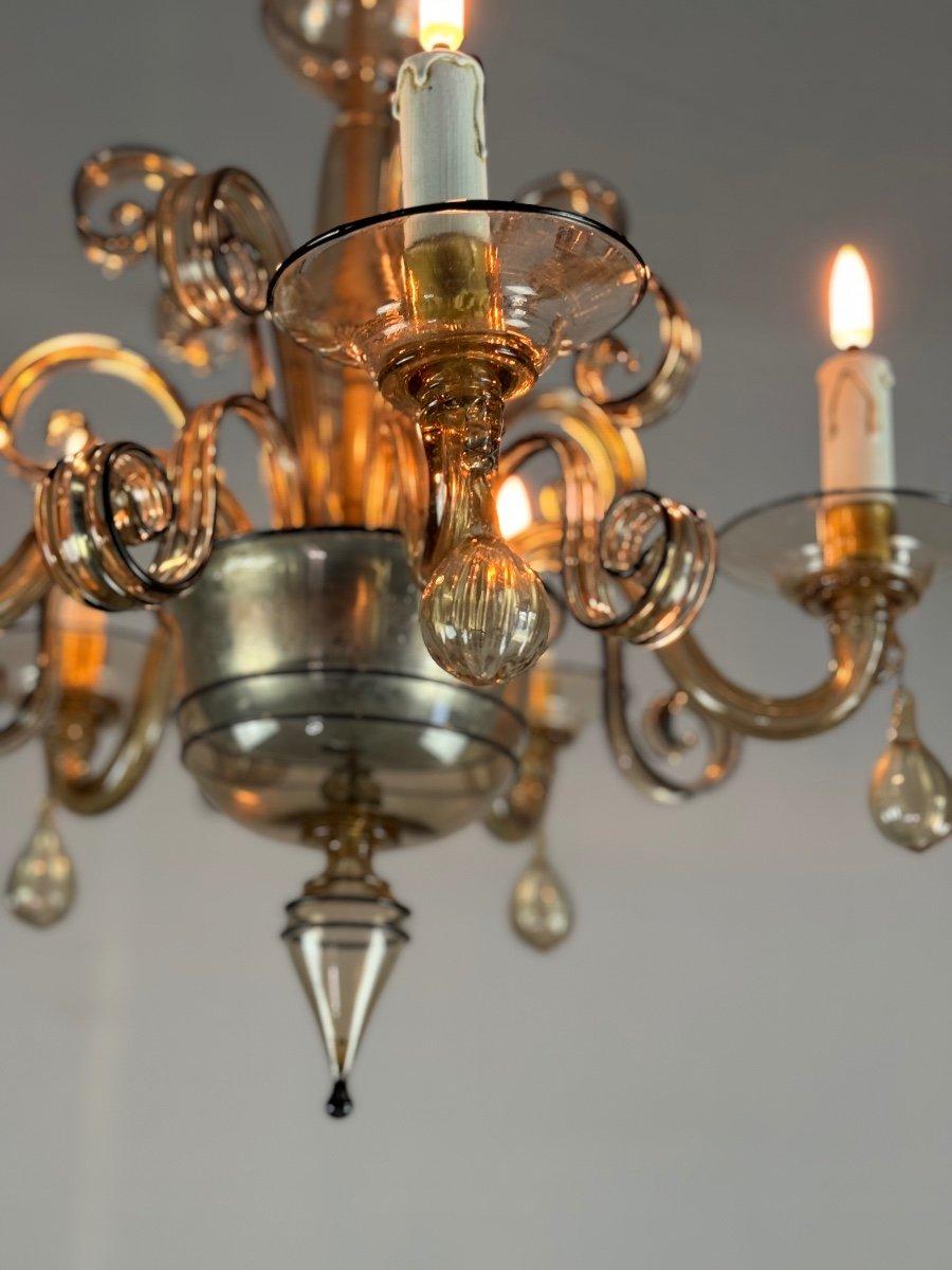Venetian Chandelier In Mordore Murano Glass 

Highlighted With Black lining 

Circa 1950 

New electrification 

5 points of light