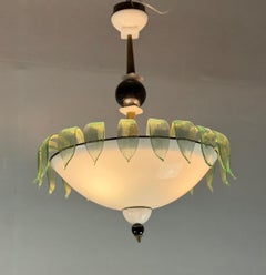 Venetian chandelier in white, black and green Murano glass sprinkled with gold