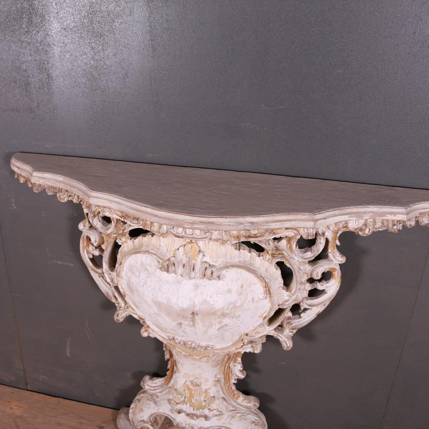 Stunning 18th century Venetian original painted console table, 1780.

Dimensions
45 inches (114 cms) wide
12 inches (30 cms) deep
37.5 inches (95 cms) high.