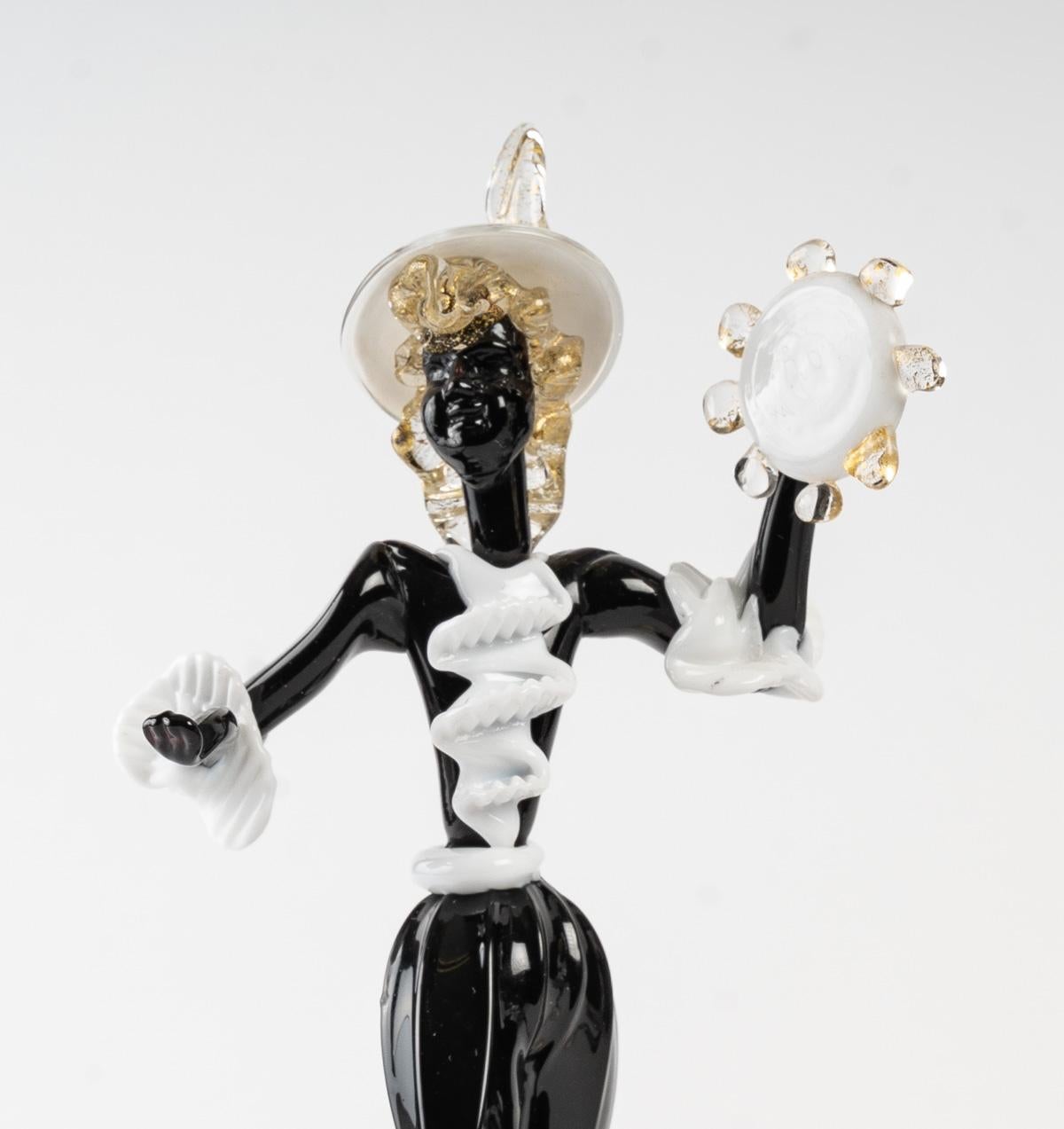 Venetian dancing couple
Murano, 20th century, in perfect condition
Measures: H 23 cm, W 12 cm, base D 9 cm.