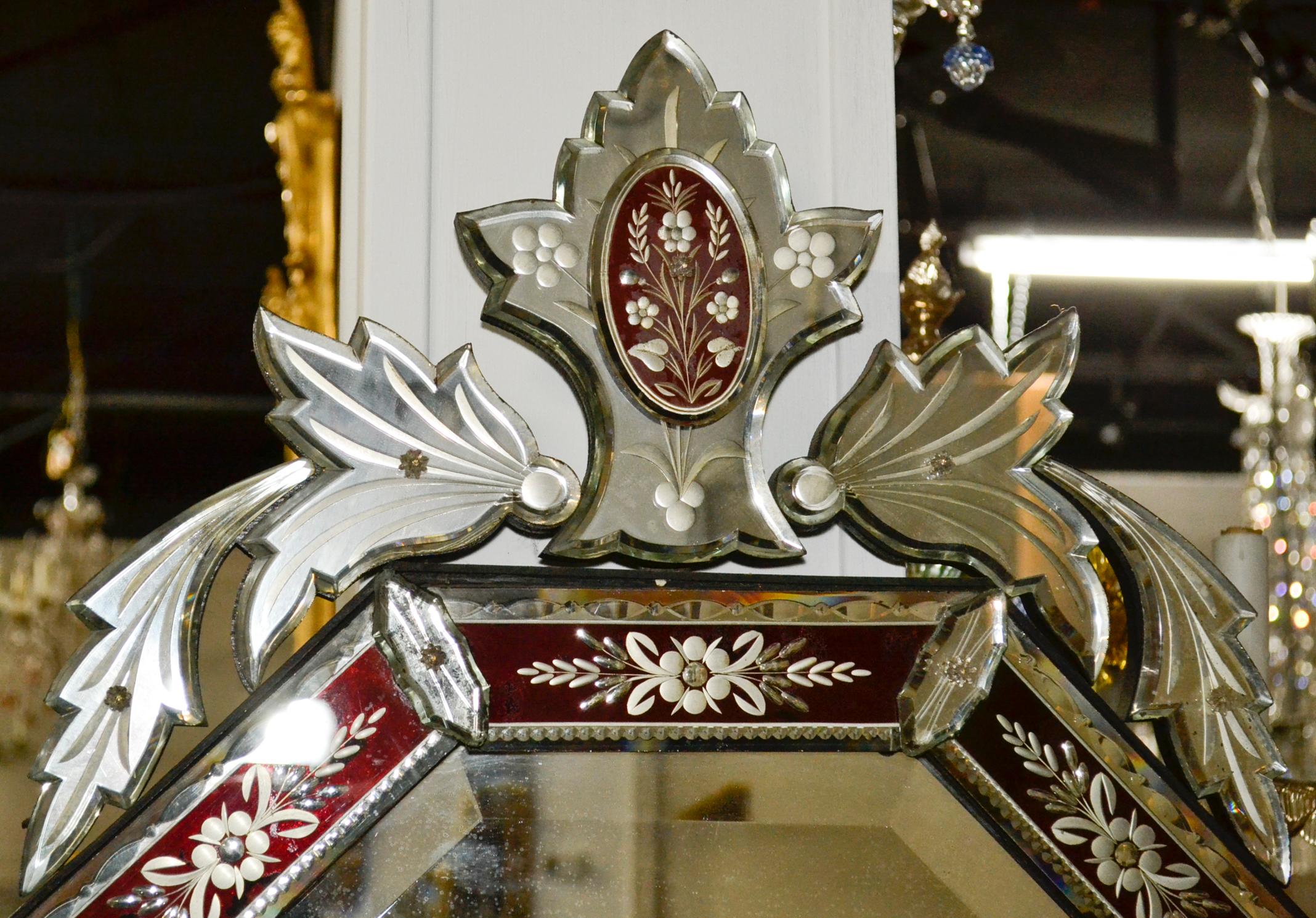 Lovely vintage Venetian etched glass octagonal mirror with red border.