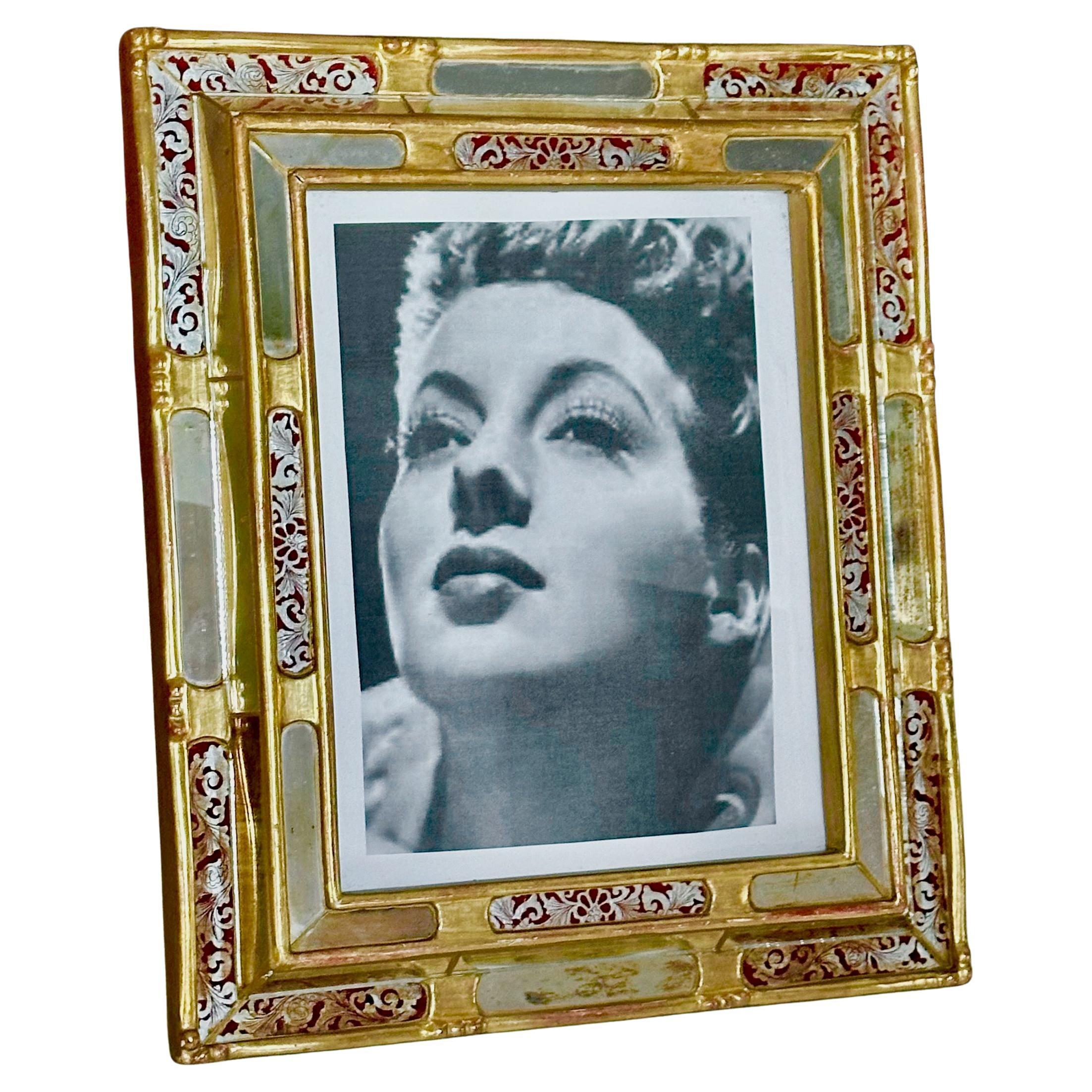 Cornice per quadri dipinta a rovescio in legno dorato veneziano