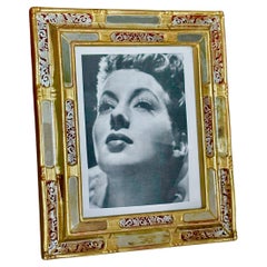 Cornice per quadri dipinta a rovescio in legno dorato veneziano