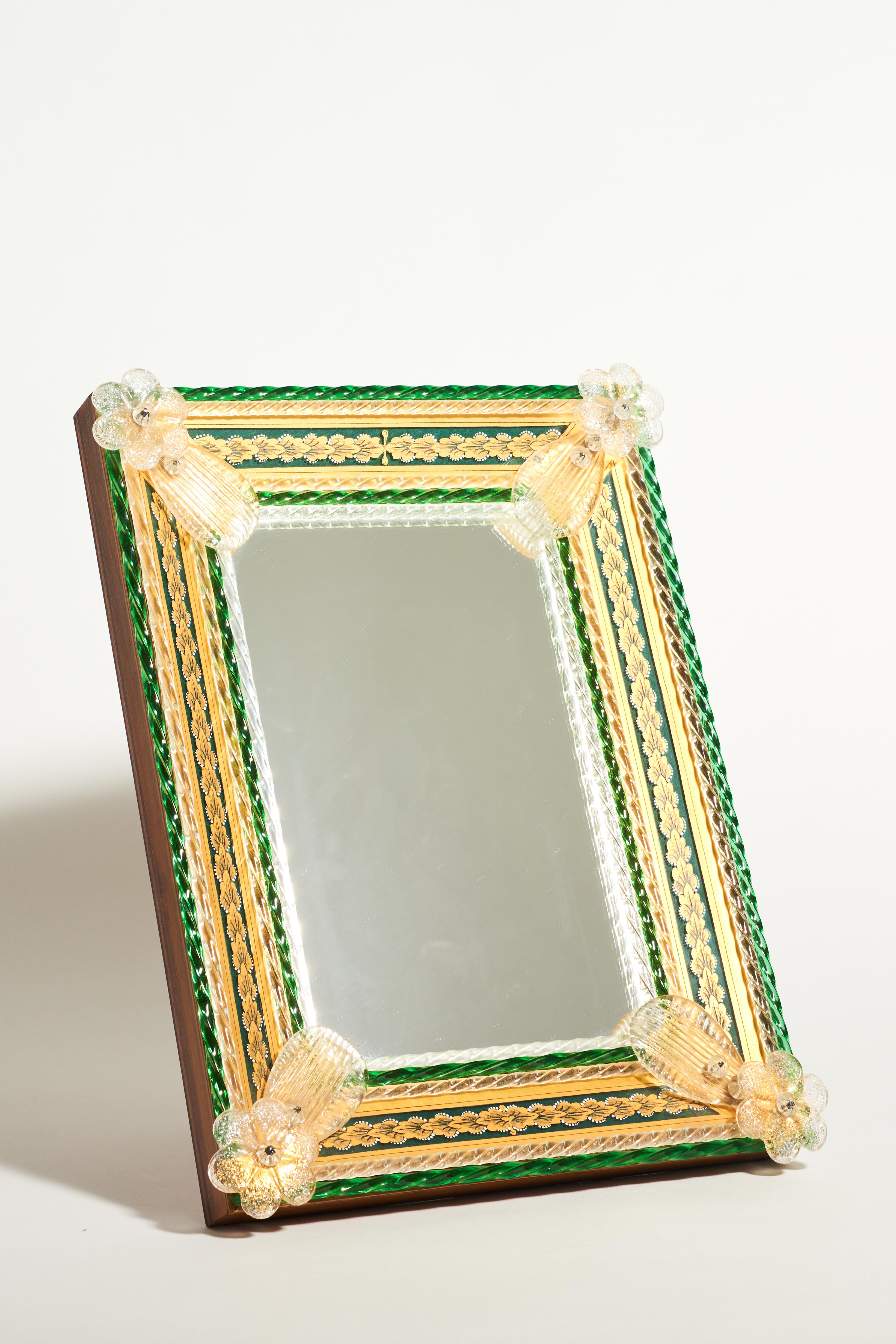 Richly decorative Venetian glass framed mirror.