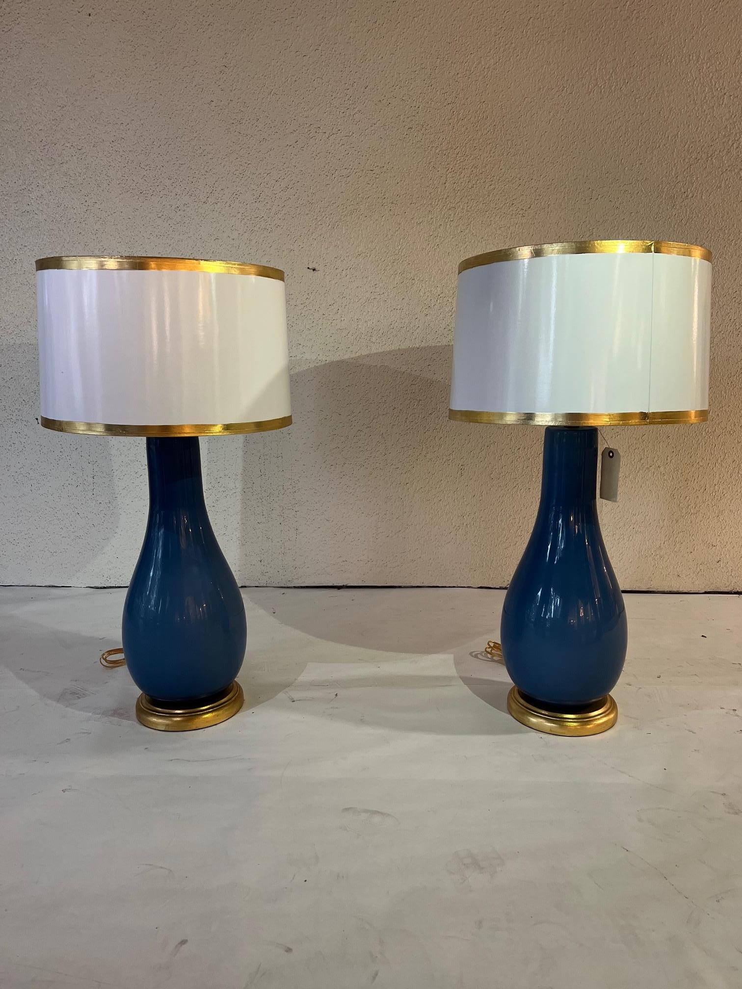 Venetian glass lamps- A pair in a beautiful blue with gold bases. With white and gilt trimmed shades.