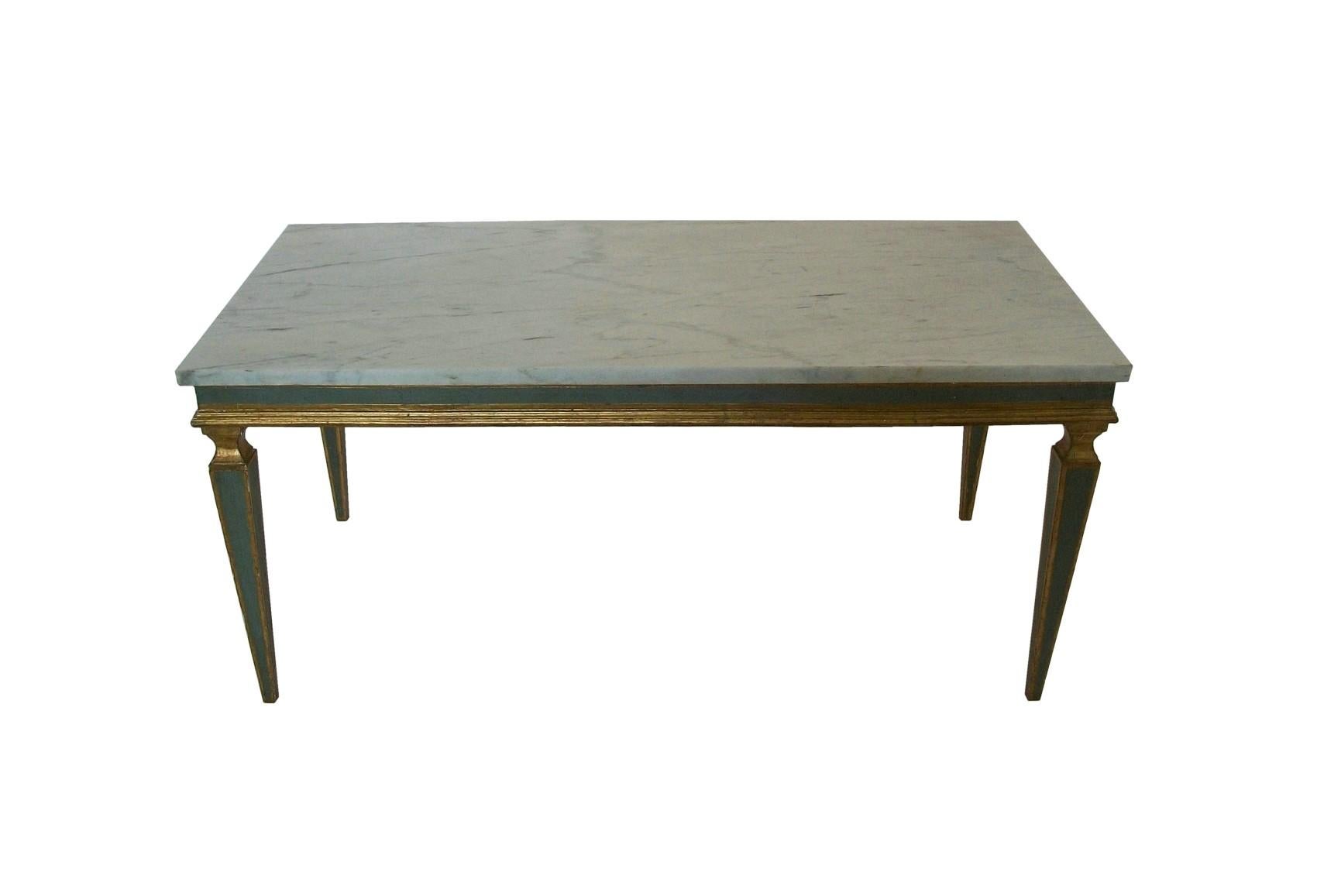 Venetian gray painted and parcel gilt coffee table with the original gray honed marble top - European quality with warm vintage patina - featuring a hand painted and gilt finish applied over gesso base coat - softwood construction to the base -