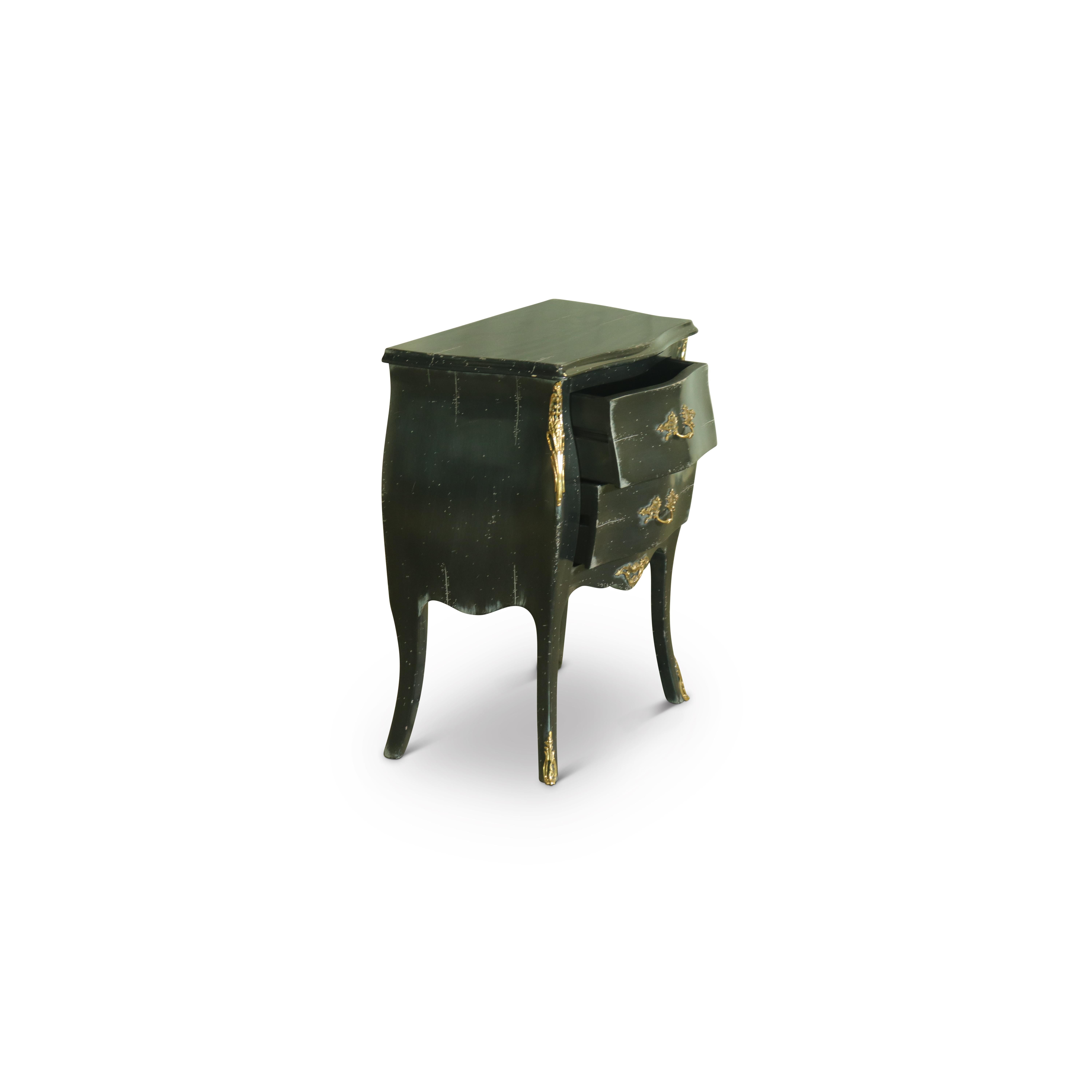 An exquisite pair of Luigi XV ebonized cherrywood nightstands, complete with gilt brass and bronze ormolu mounts and cabriole legs. These nightstands have been handcrafted in Venezia by Italian Designer House; Vangelista Mobili. These pieces come