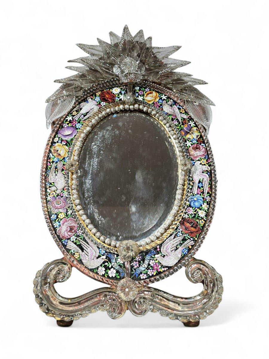 VENETIAN MICROMOSAIC MIRROR – 19TH CENTURYVENETIAN MICROMOSAIC MIRROR – 19TH CENTURY
Exquisite Venetian mirror made in Italy in the 19th century, executed using the delicate micromosaic technique. This handcrafted piece is richly decorated with