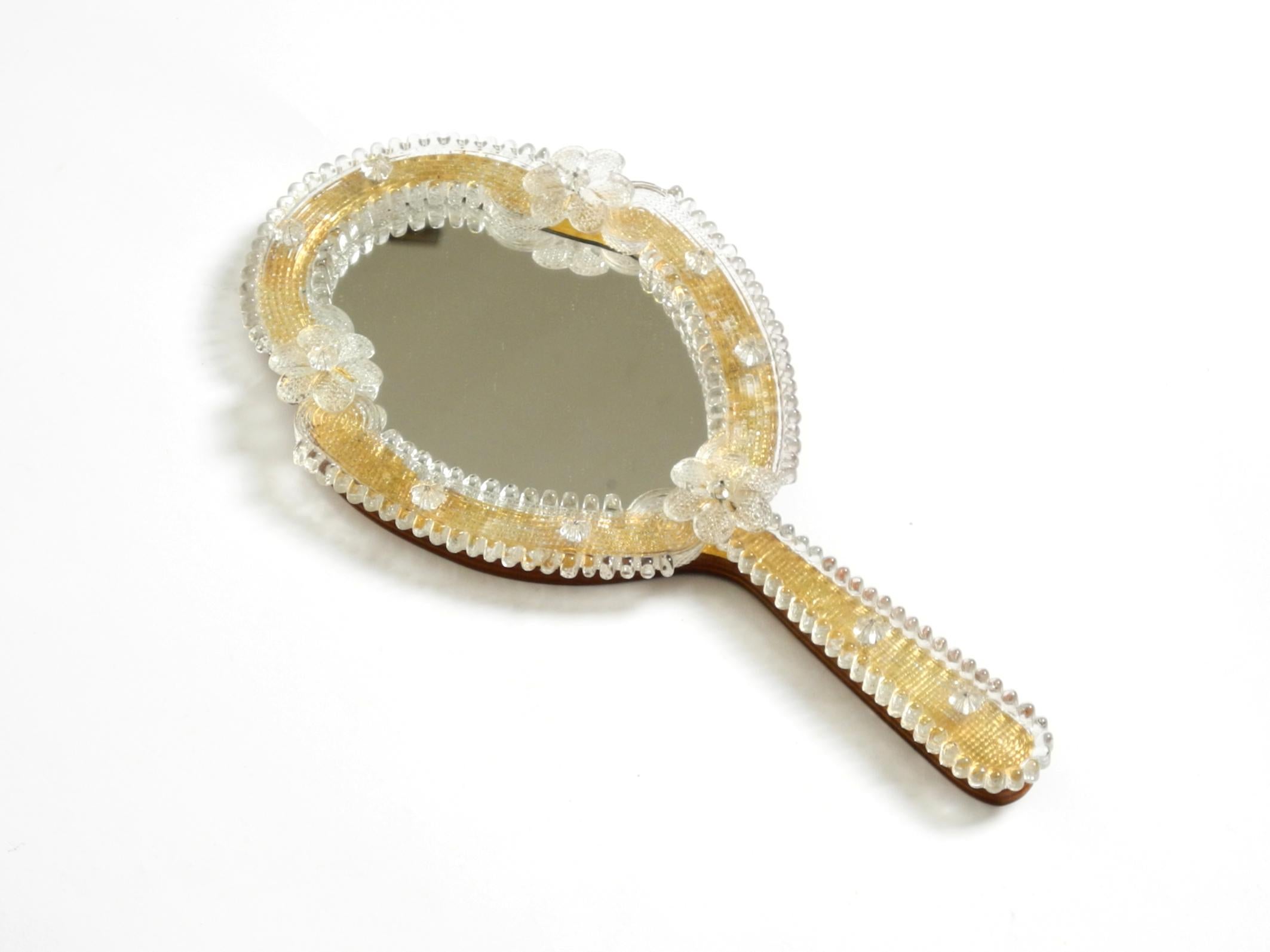 Italian Venetian Mid-Century hand or wall mirror with Murano glass rosettes For Sale