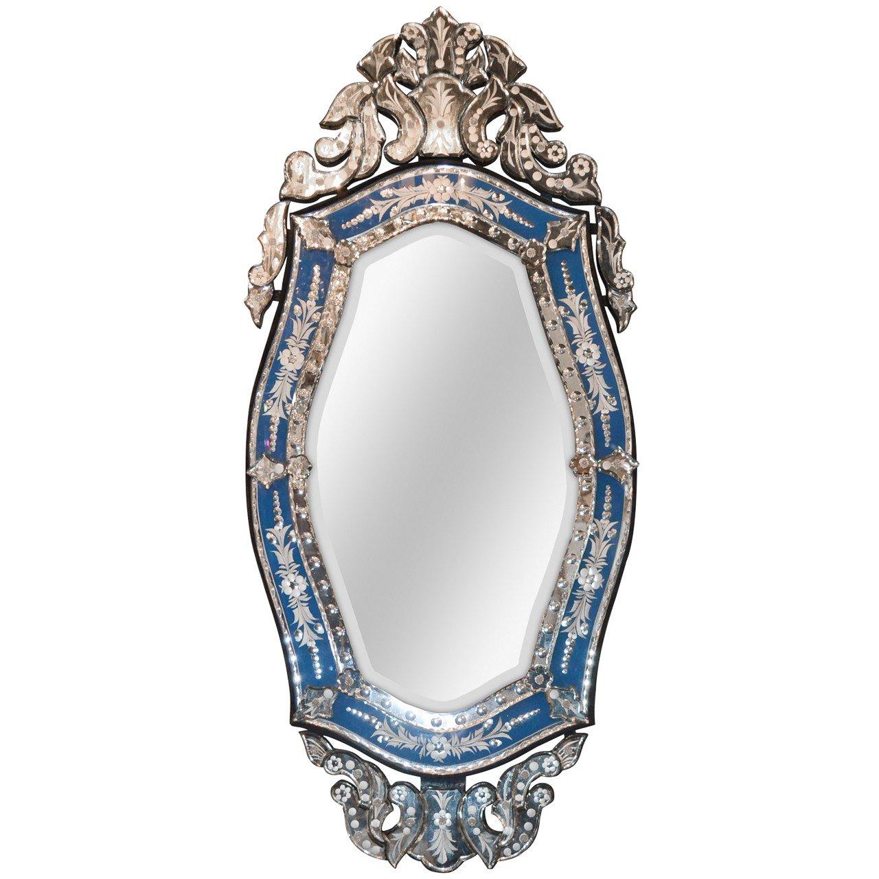 A dazzling Venetian statement mirror! Unusual blue color.
Made in Italy in the 1920s.