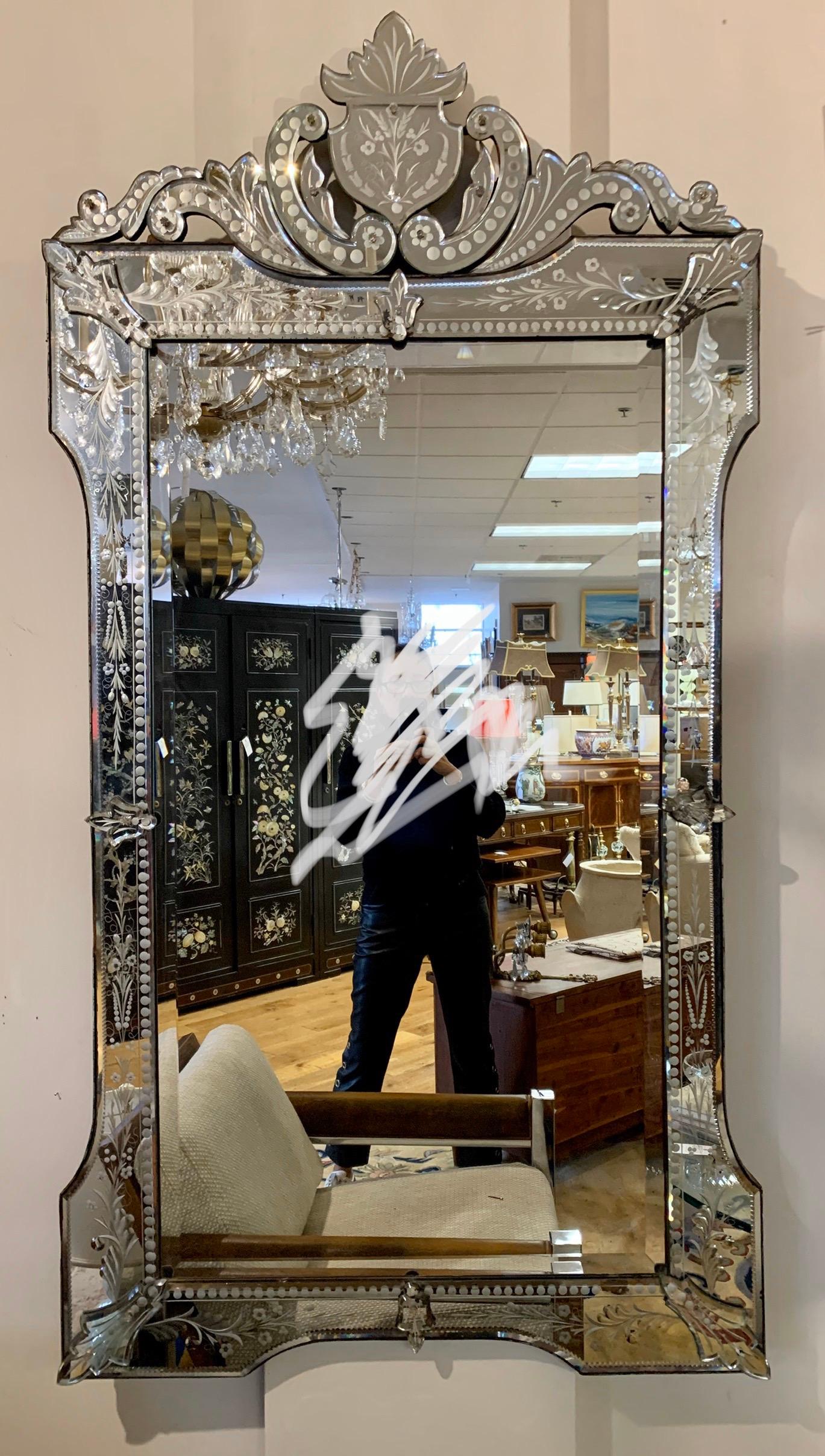 Extra large rectangular Venetian mirror, circa 1890-1899. Topped by elaborate pediment. Great condition with only minor losses to its silvered mirror backing, see all pictures. The biggest Venetian mirror you may ever see, it is 66