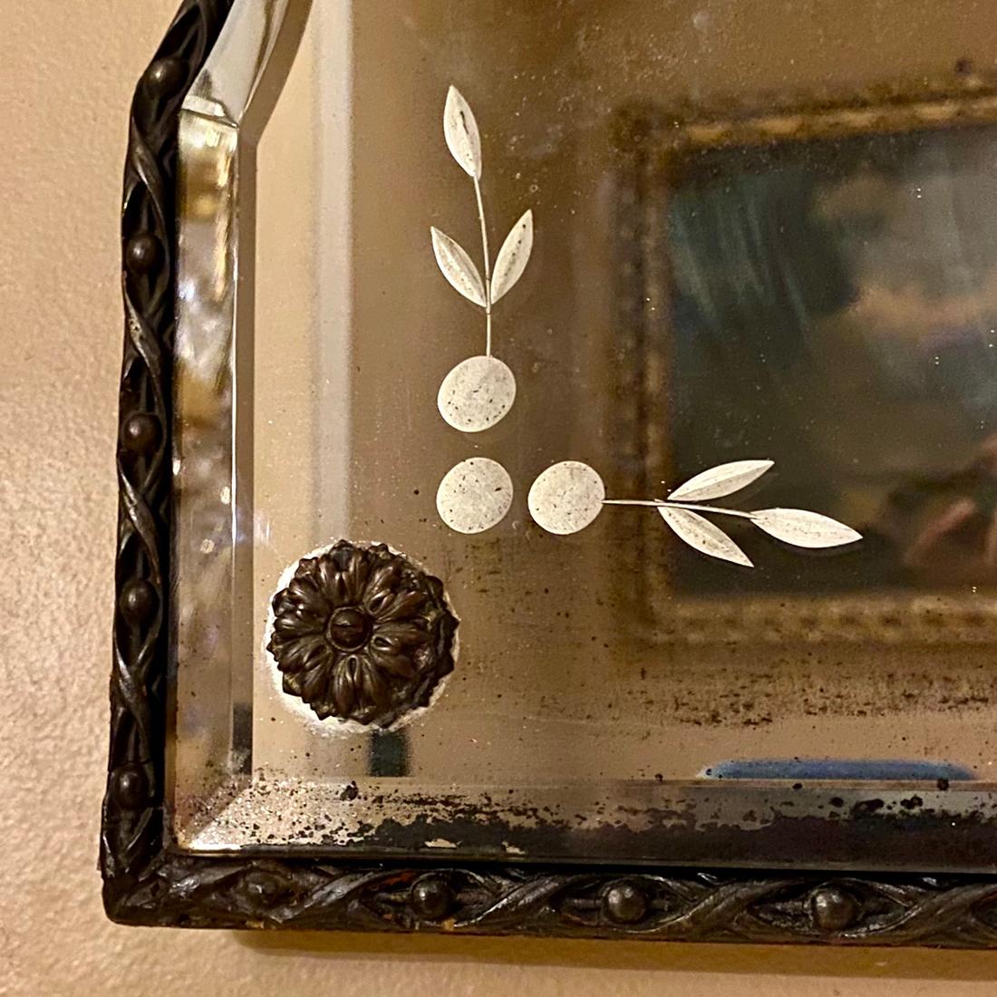 A small scale circa 1920's etched Venetian mirror with patinated composition frame.

Measurements:
Height: 29