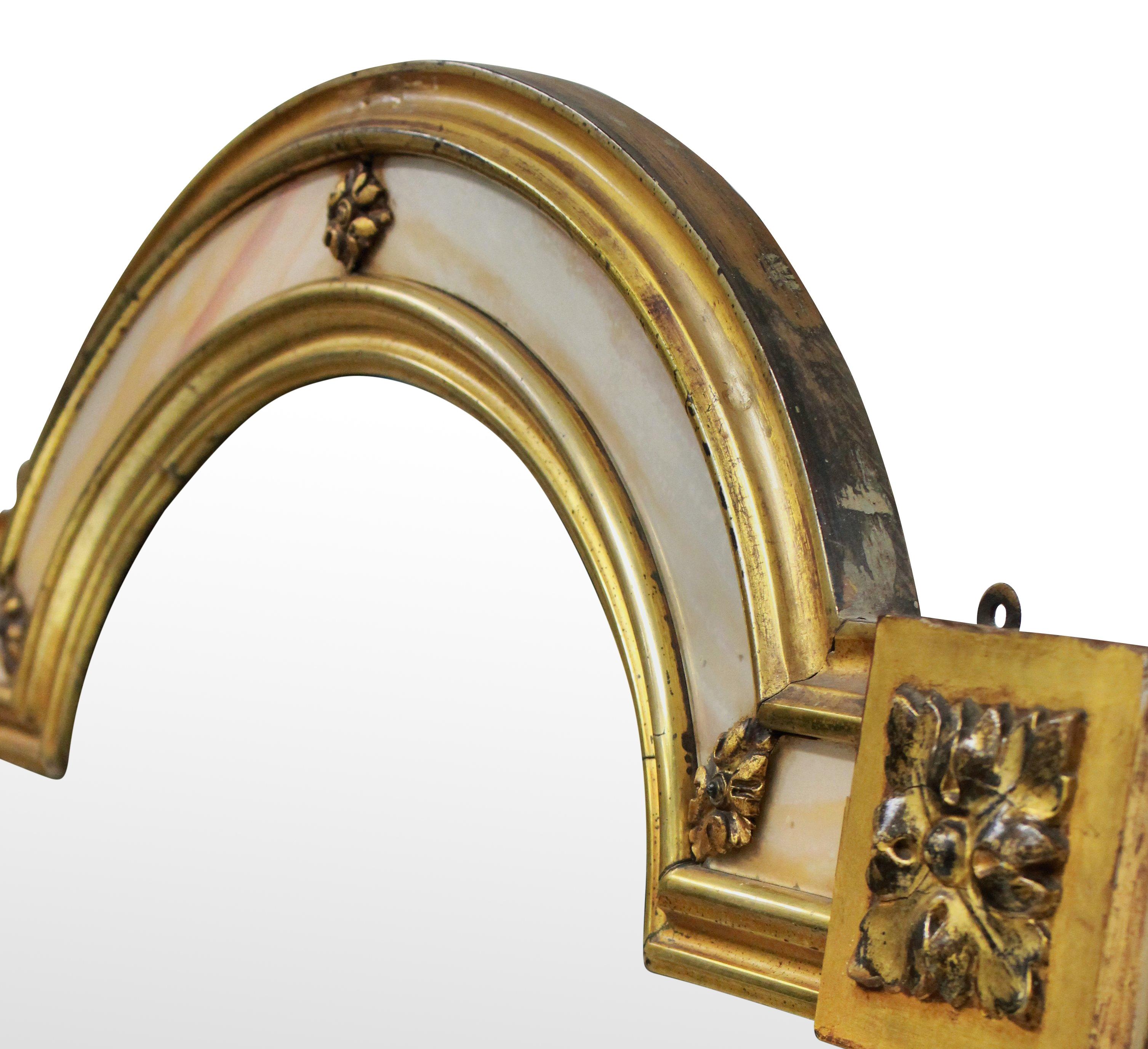 A Venetian mirror with a good water gilded frame with marble slip. The mirror plate is bevelled.

  