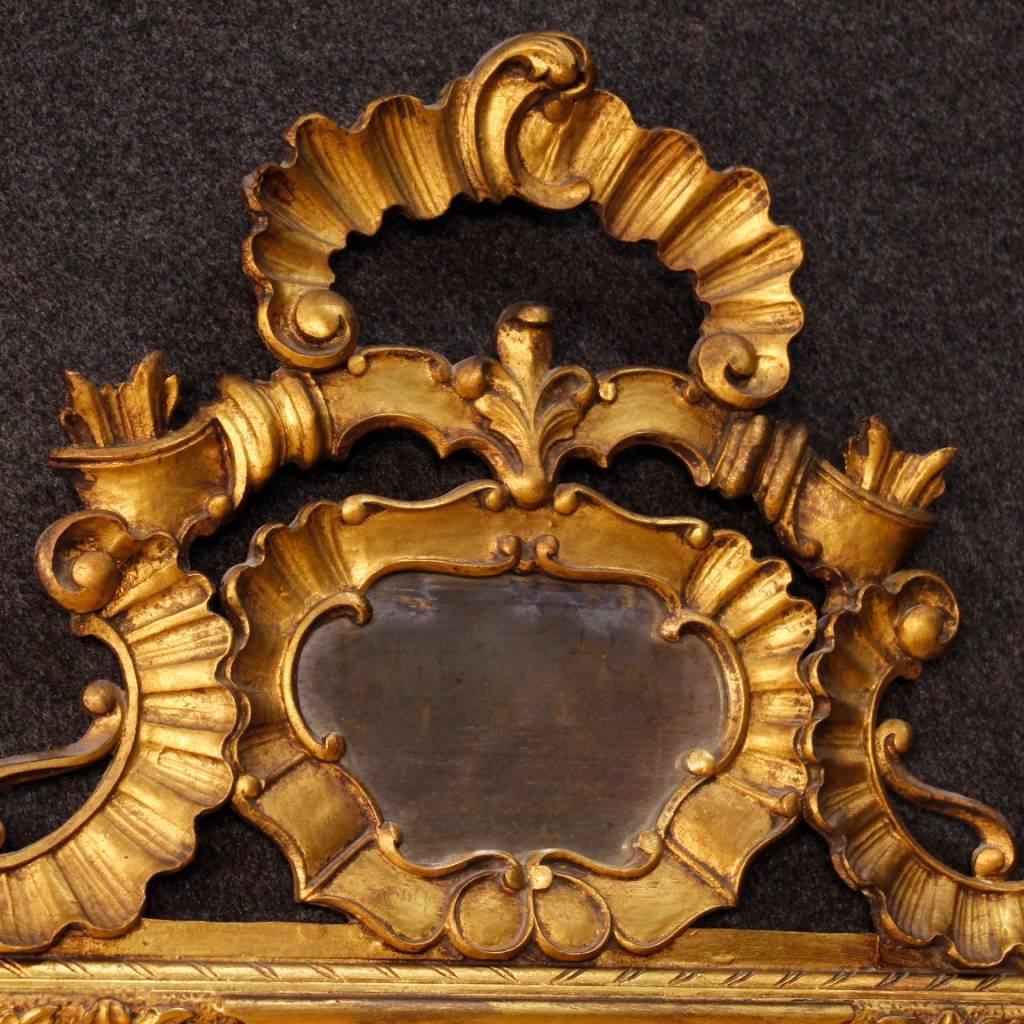 Great Venetian mirror from 20th century. Furniture in finely carved and gilded wood. Original mirror in good condition. Ideal mirror for a living room or bedroom. Moulding complete with mirror. Mirror that has undergone a conservative restoration,