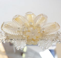 Venetian mirror in Murano glass adorned with gold details and flowers - 1960s