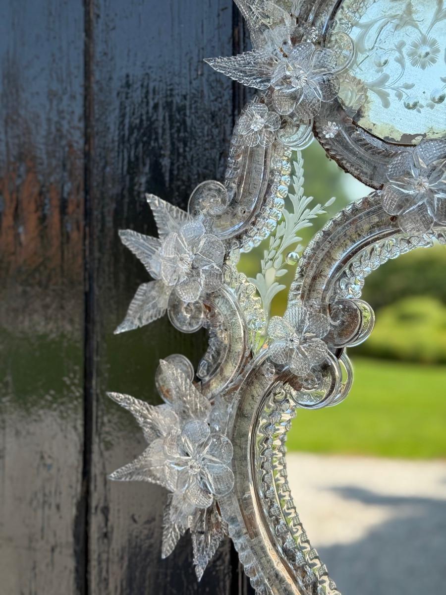 French Venetian mirror with scalloped edges, made of colourless Murano glass, circa 188 For Sale