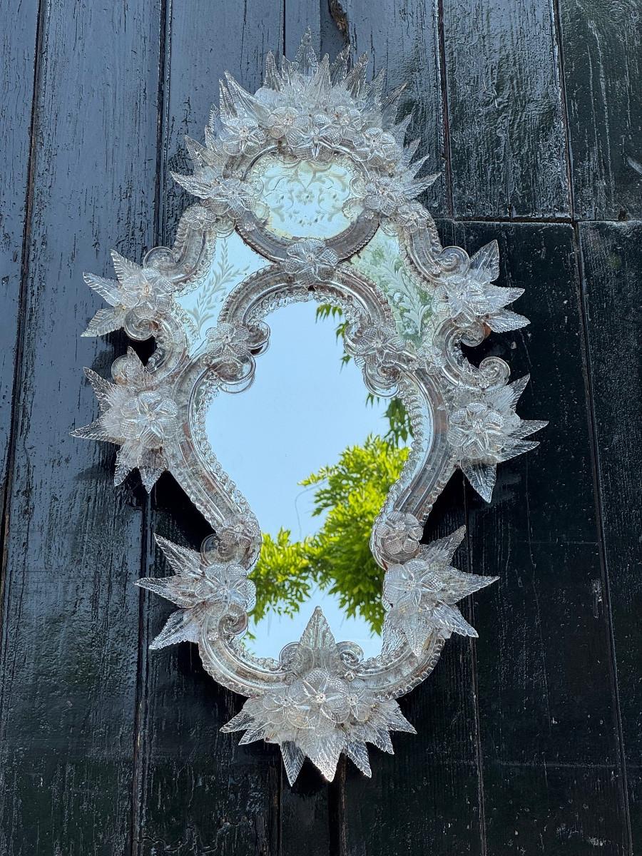 Silver Venetian mirror with scalloped edges, made of colourless Murano glass, circa 188 For Sale