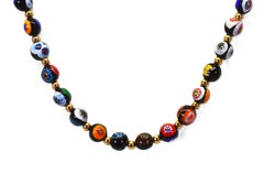 Collar de cuentas con diseño de mosaico veneciano y detalles en oro amarillo de 14 quilates