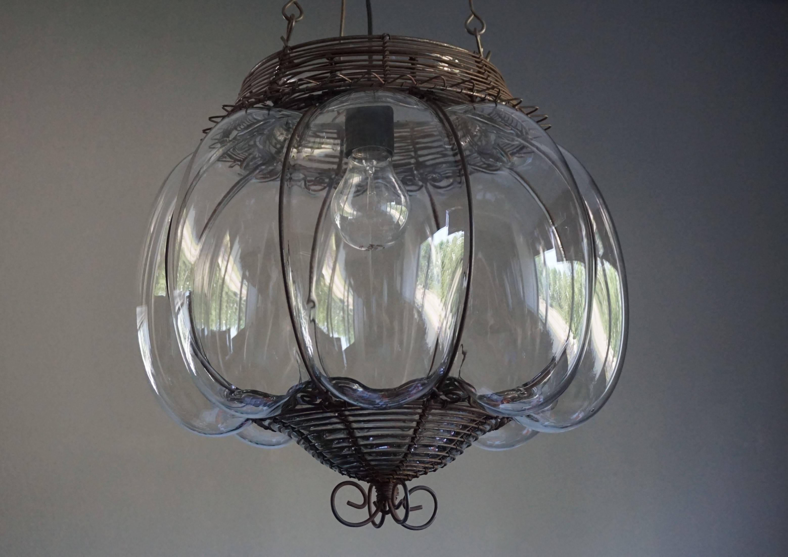 Unique, practical size and highly stylish Venetian chandelier.

Over the years we have sold some very rare and special Venetian pendants and this striking light fixtures is right up there with the most interesting and decorative ones. The