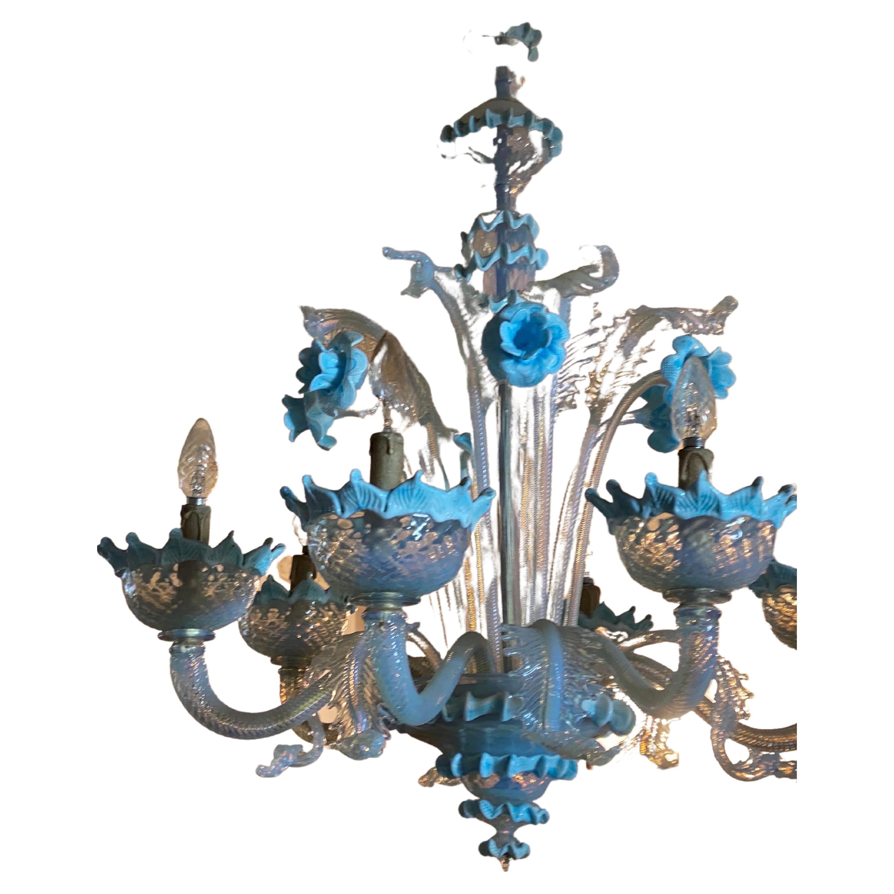Large imposing antique Italian Venetian Murano six arms chandelier from the first half of the Midcentury 1940s. The lamp is complete and intact. Made of crystal glass iridescent and opal white and blue accents and flowers beautifully executed in