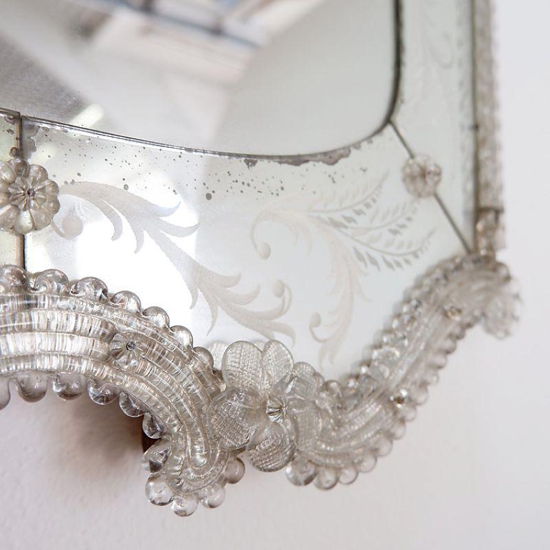 beautifully ornated floral mirror with a floral glass frame for an enchanting finished look.