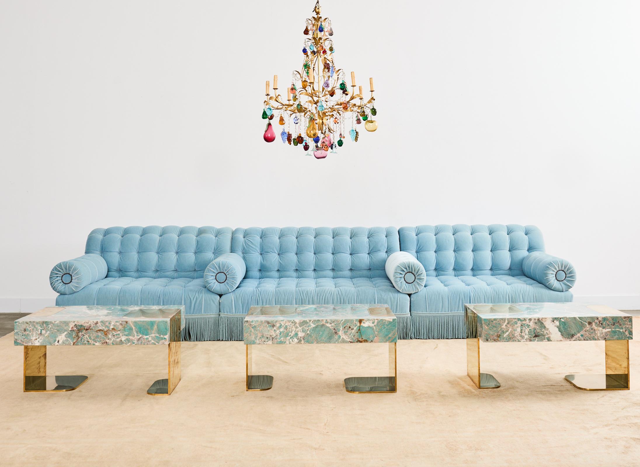 Fantastic Venetian Murano glass eight-light chandelier featuring multiple tiers of hand-crafted glass fruit. The large iron frame has a gilded finish with an intentionally aged patina. The frame is decorated with strands of bead crystals and
