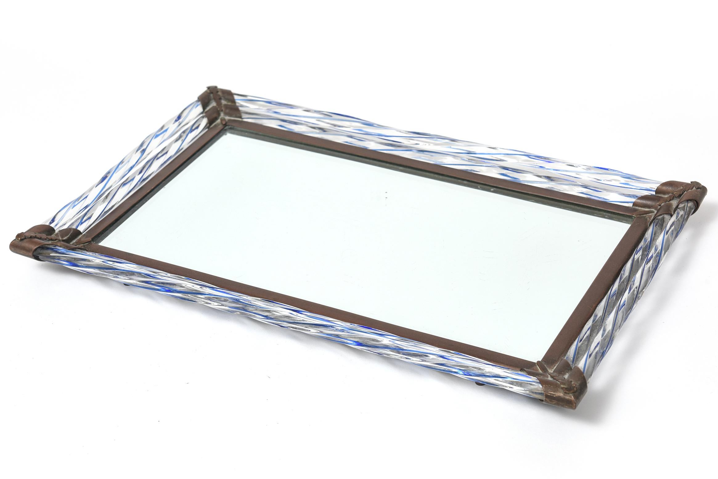 Stunning Venetian mirrored tray from the 1930's era used by the previous owner to display perfumes, but also perfect as a serving piece, to hold liquor or other decorative objects. It also could be converted to a frame to hold a large family photo.