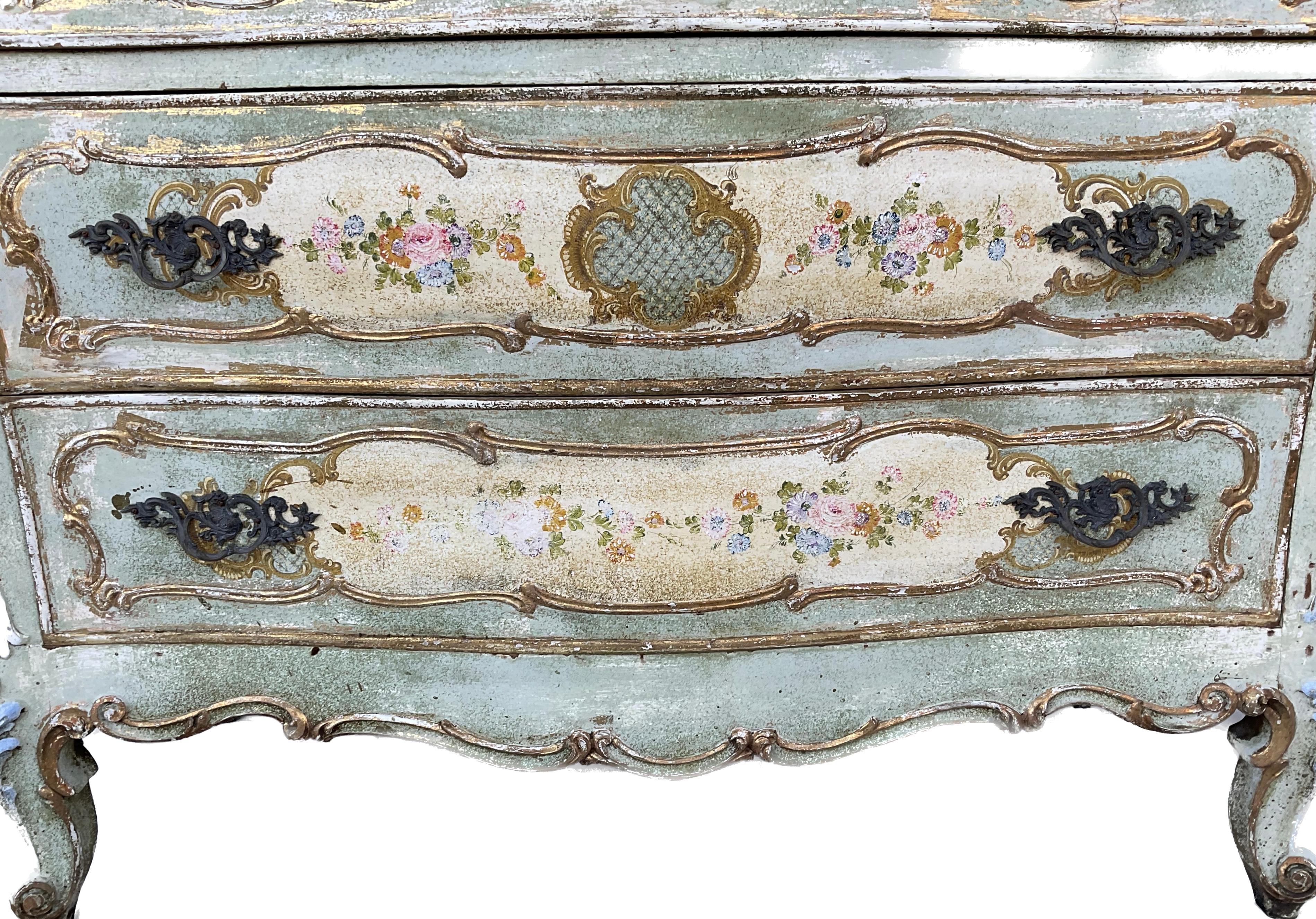 19th Century Venetian Painted Bombe'' 3 Drawer Chest. Elaborately painted in the typical Venetian Baroque style with bright color and floral motif. The finish worn to a perfect patina.