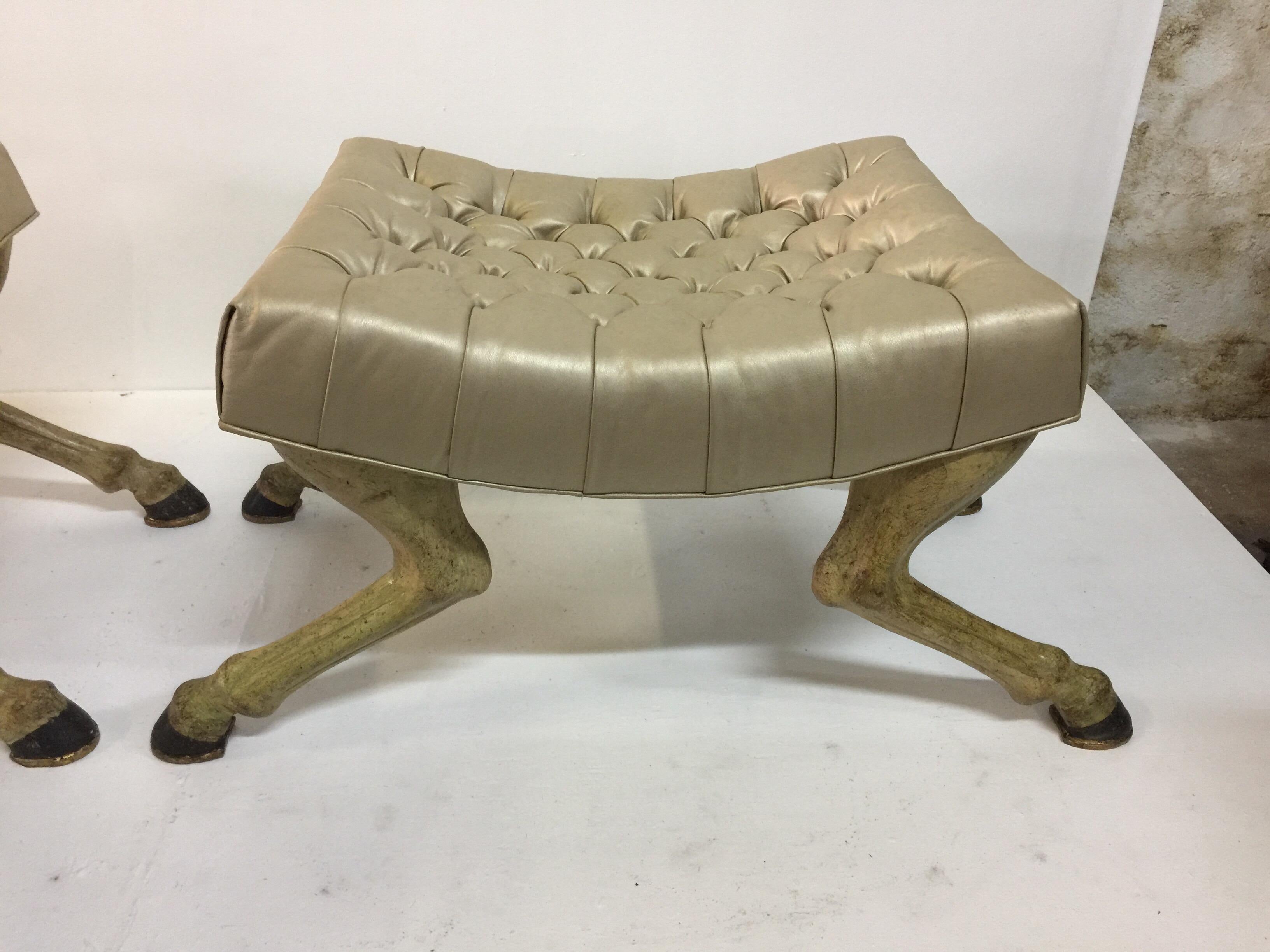 Metallic toned leather top is tufted beautifully. The horse legs are polychromed fruitwood, hand painted and have aged accordingly, Venetian made. Please be aware that these benches are delicate as a result of the splayed feet and cannot hold a lot