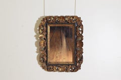 Venetian Rococo Boldly Carved, Gilded, and Ebonized Mirror, Mid-18th Century