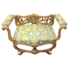 Veneziano  Sedile da finestra rococò in legno dorato... XIX secolo.