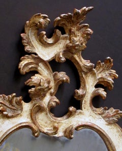 Venetian Rococo Revival Ivory Painted and Parcel-Gilt Cartouche-Shaped Mirror