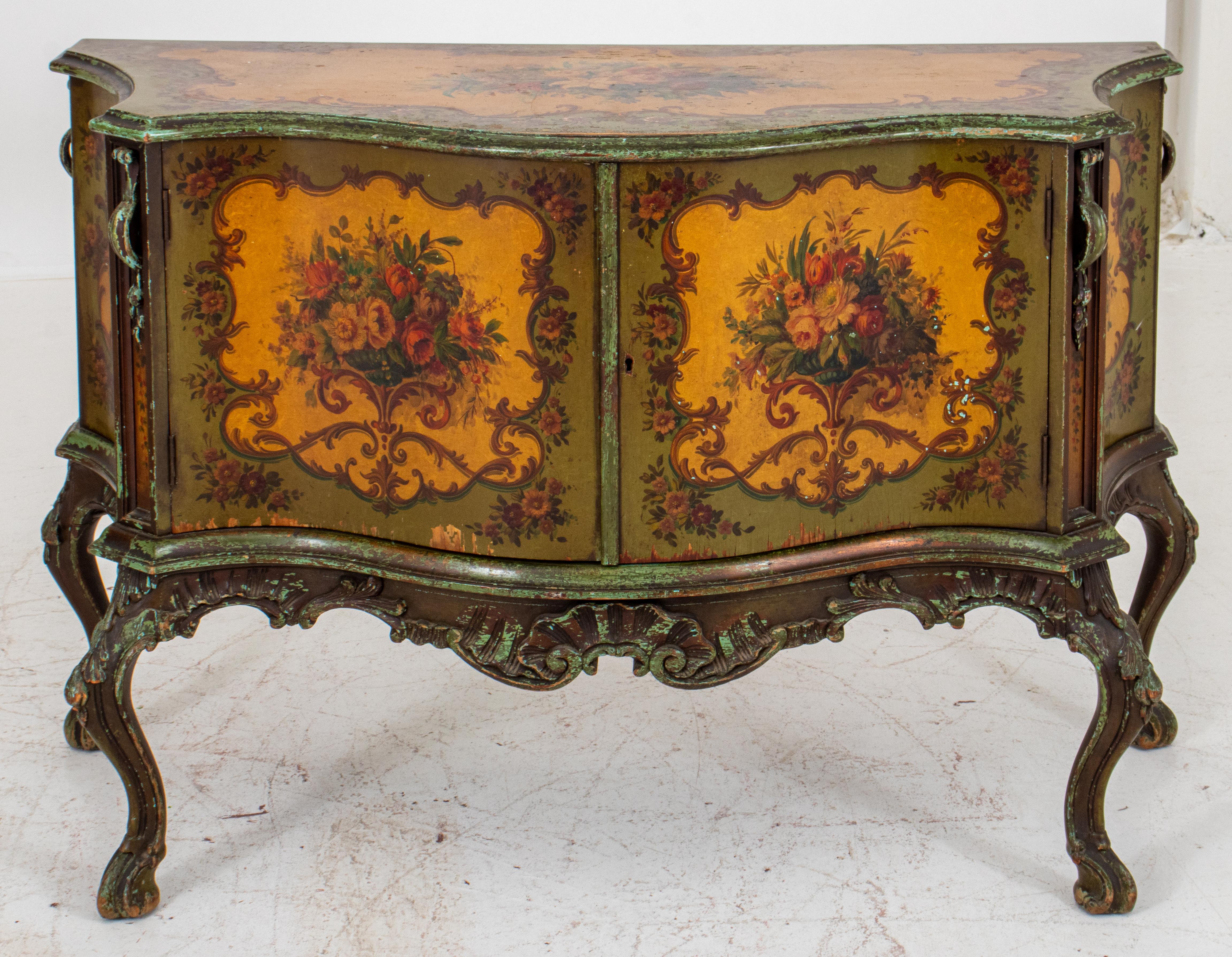 Venetian rococo revival 'lacca povera' commode, with painted floral panels, two shelf interior, carved cabriole legs, unmarked. 33.25