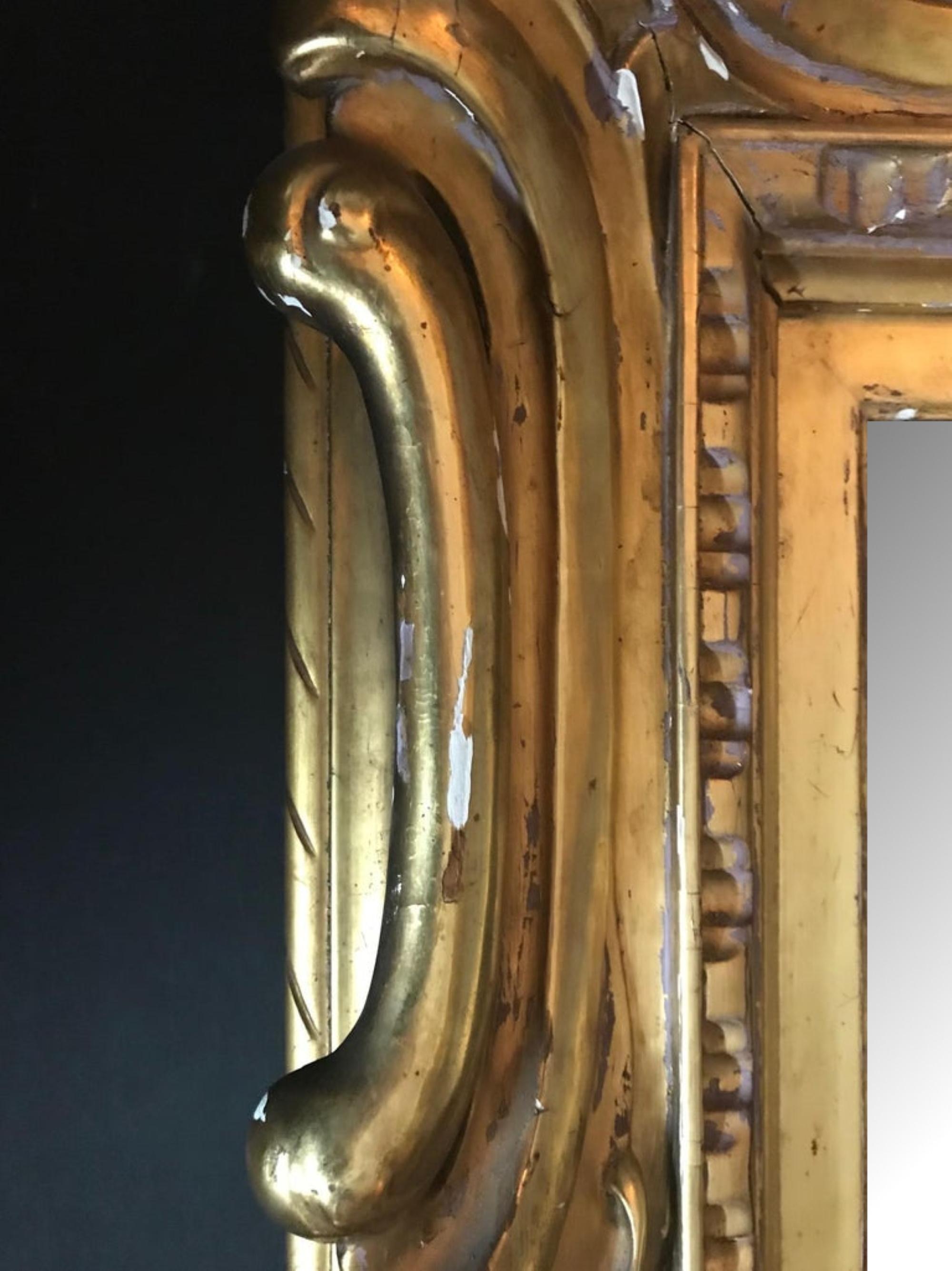 Italian Venetian Sansovino Palatial Early Baroque Style Carved and Gilded Mirror For Sale