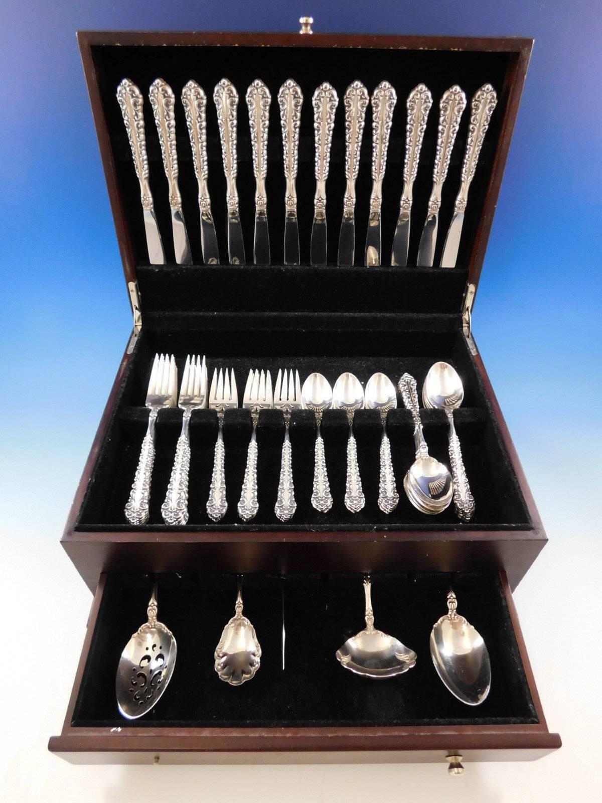 Venetian scroll by Oneida sterling silver flatware set, 65 pieces. This set includes:

12 knives, 9 1/8