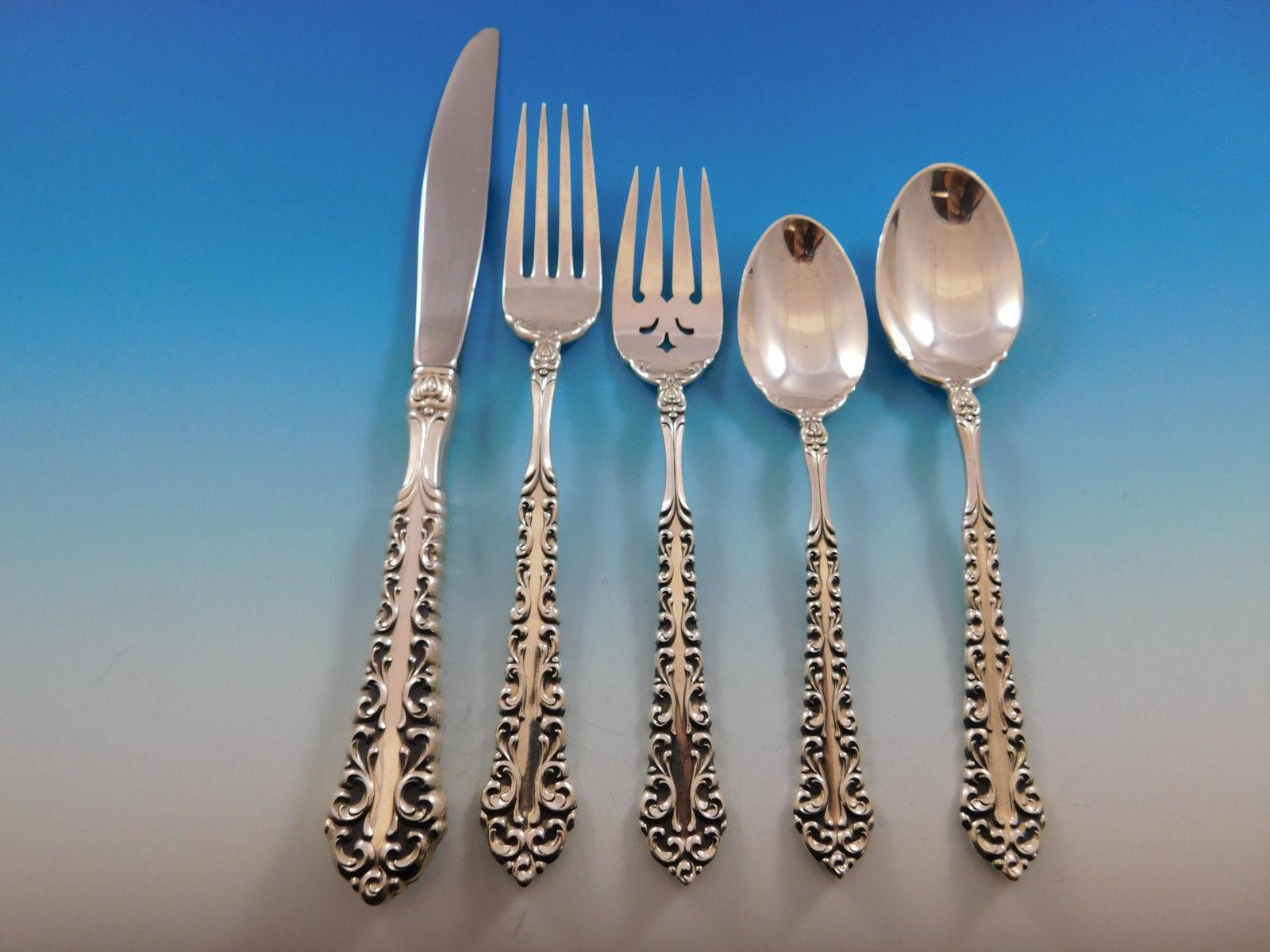 Venetian scroll by Oneida sterling silver flatware set, 69 pieces. This set includes:

12 knives, 9 1/8