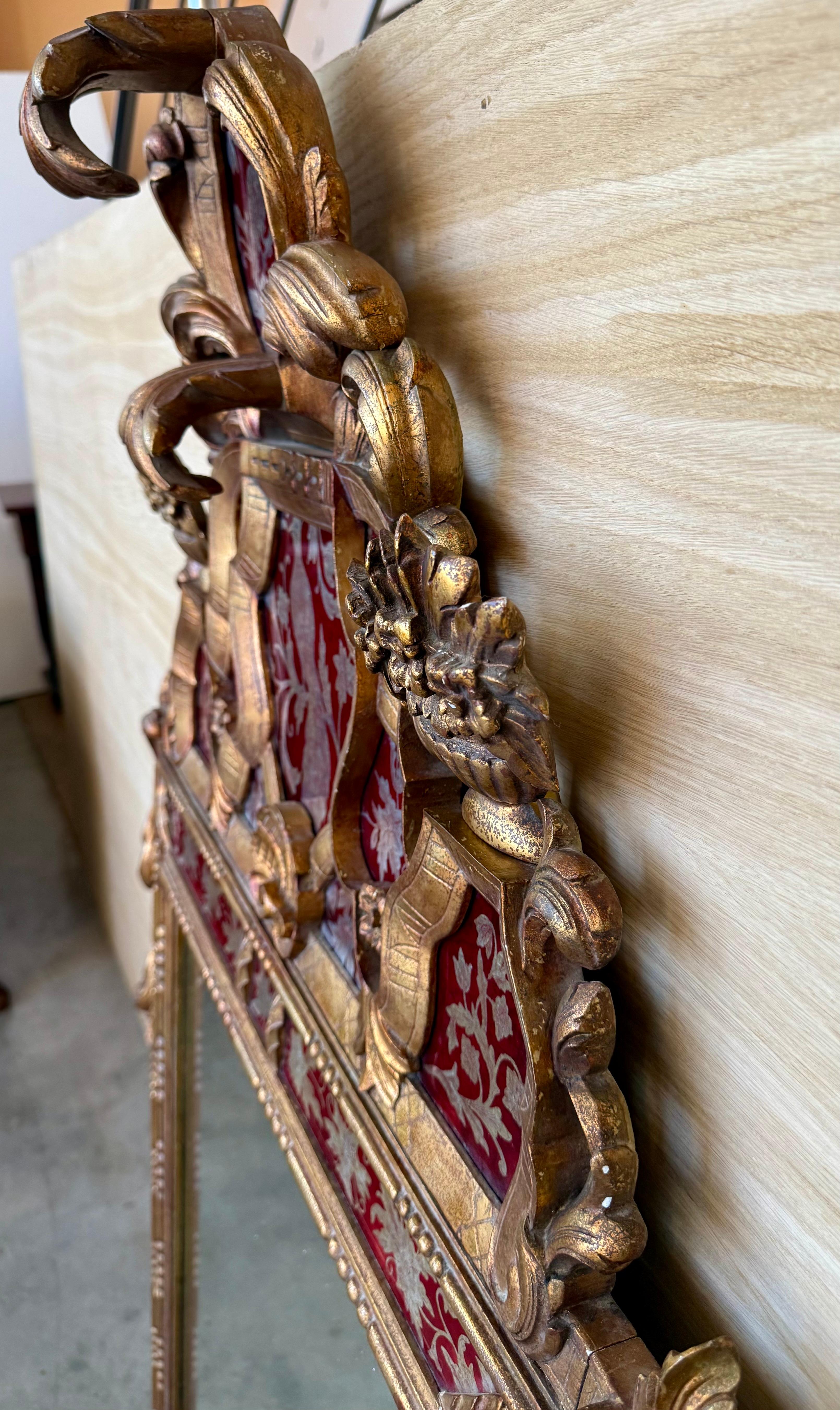 XX secolo Venetian Style Carved Wood Gilted Mirror with Red Glass Border in vendita