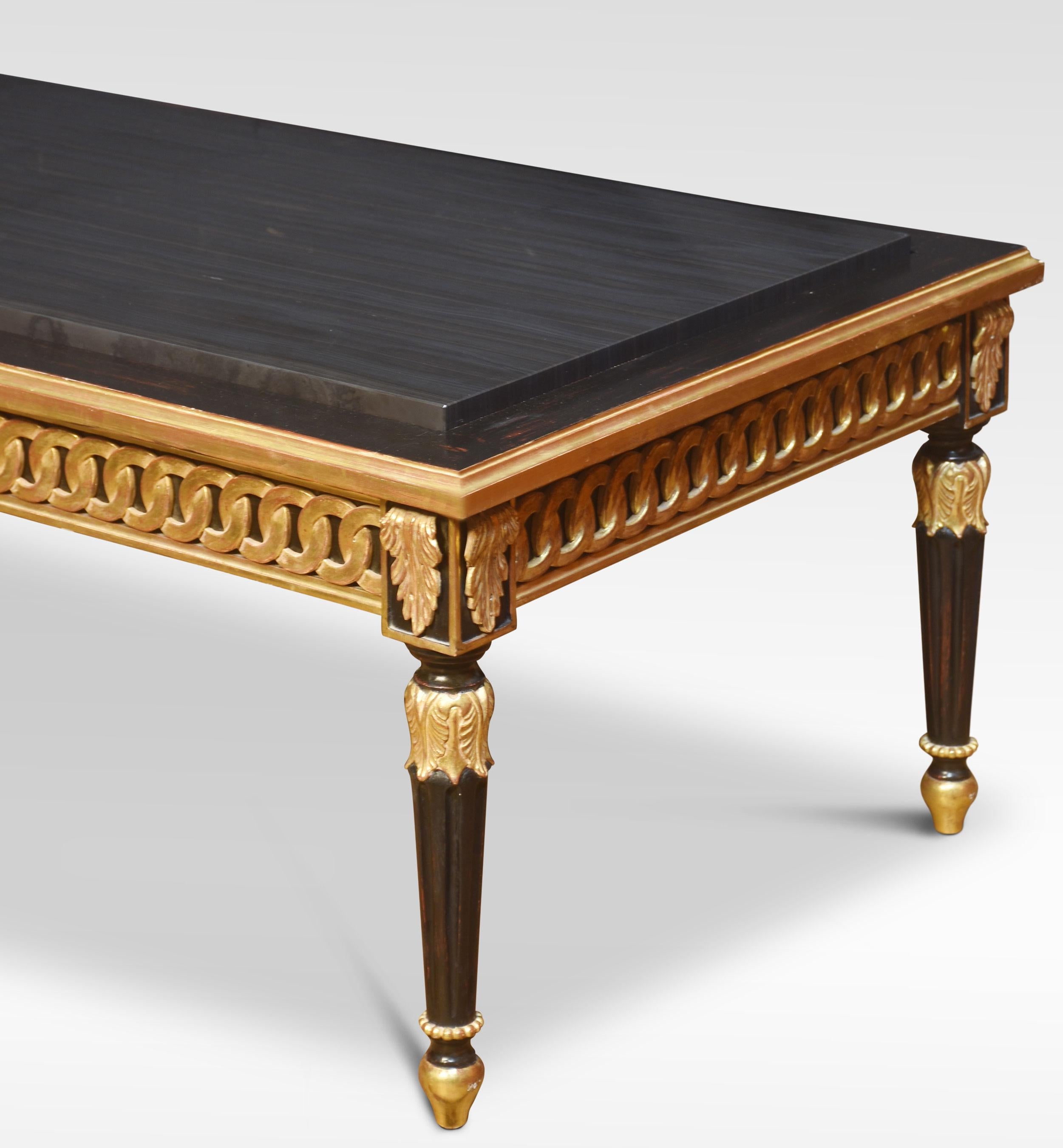 Venetian style coffee table, the large rectangular black veined marble top above ebony and gilt painted base. All raised up on turned reeded tapering legs.
Dimensions
Height 19 Inches
Width 52.5 Inches
Depth 28 Inches